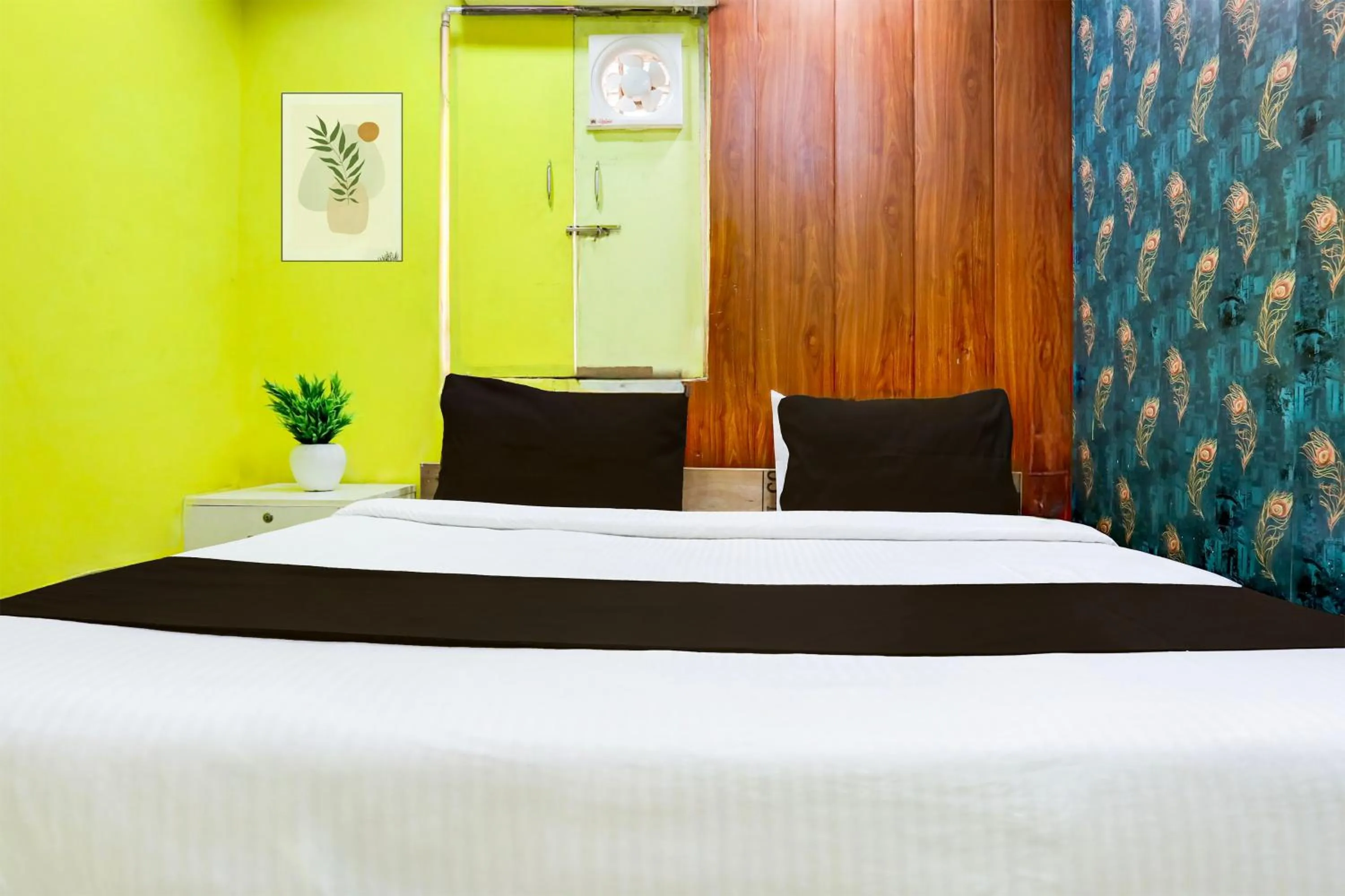 Bedroom in Hotel O A K Residency