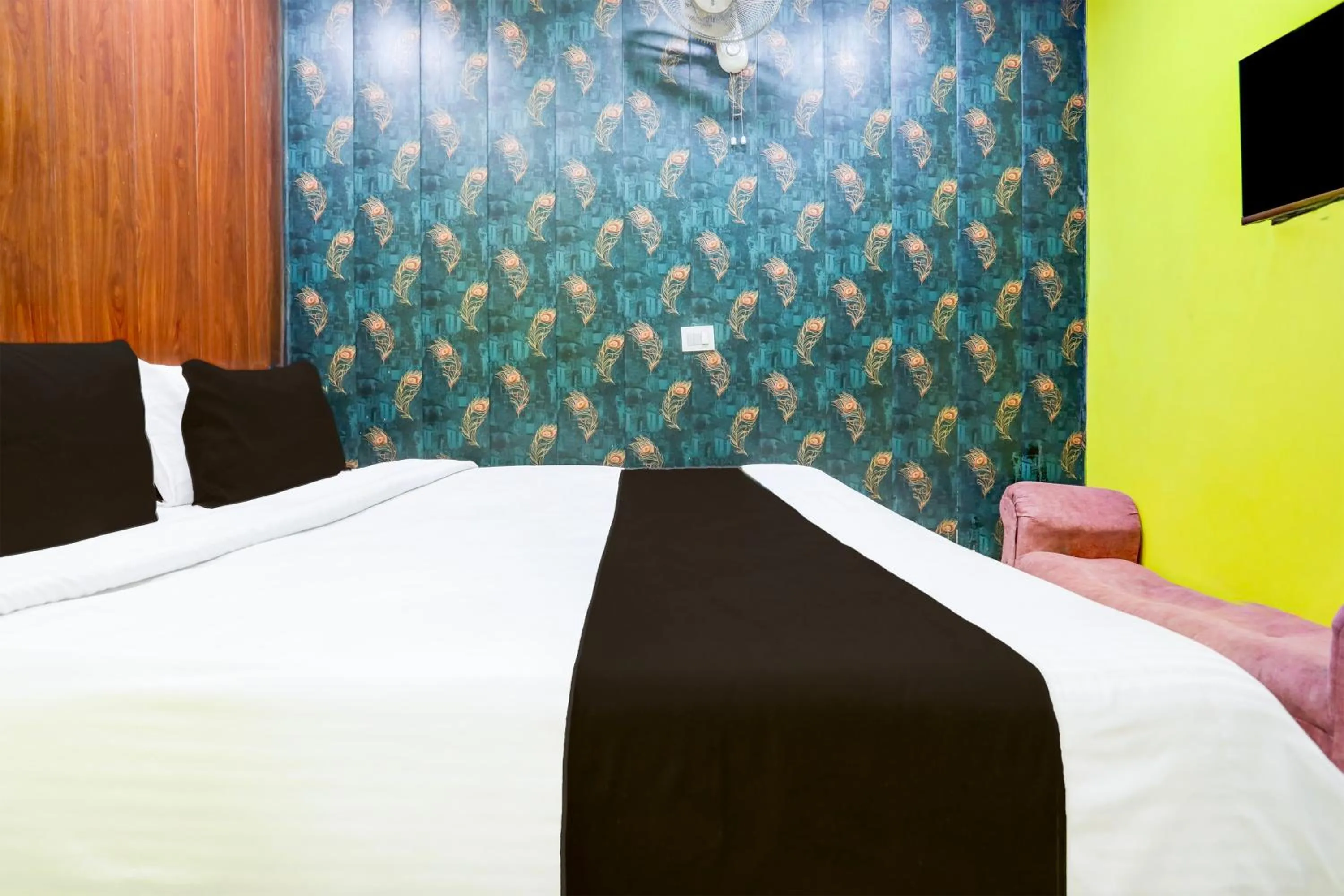 Bedroom in Hotel O A K Residency