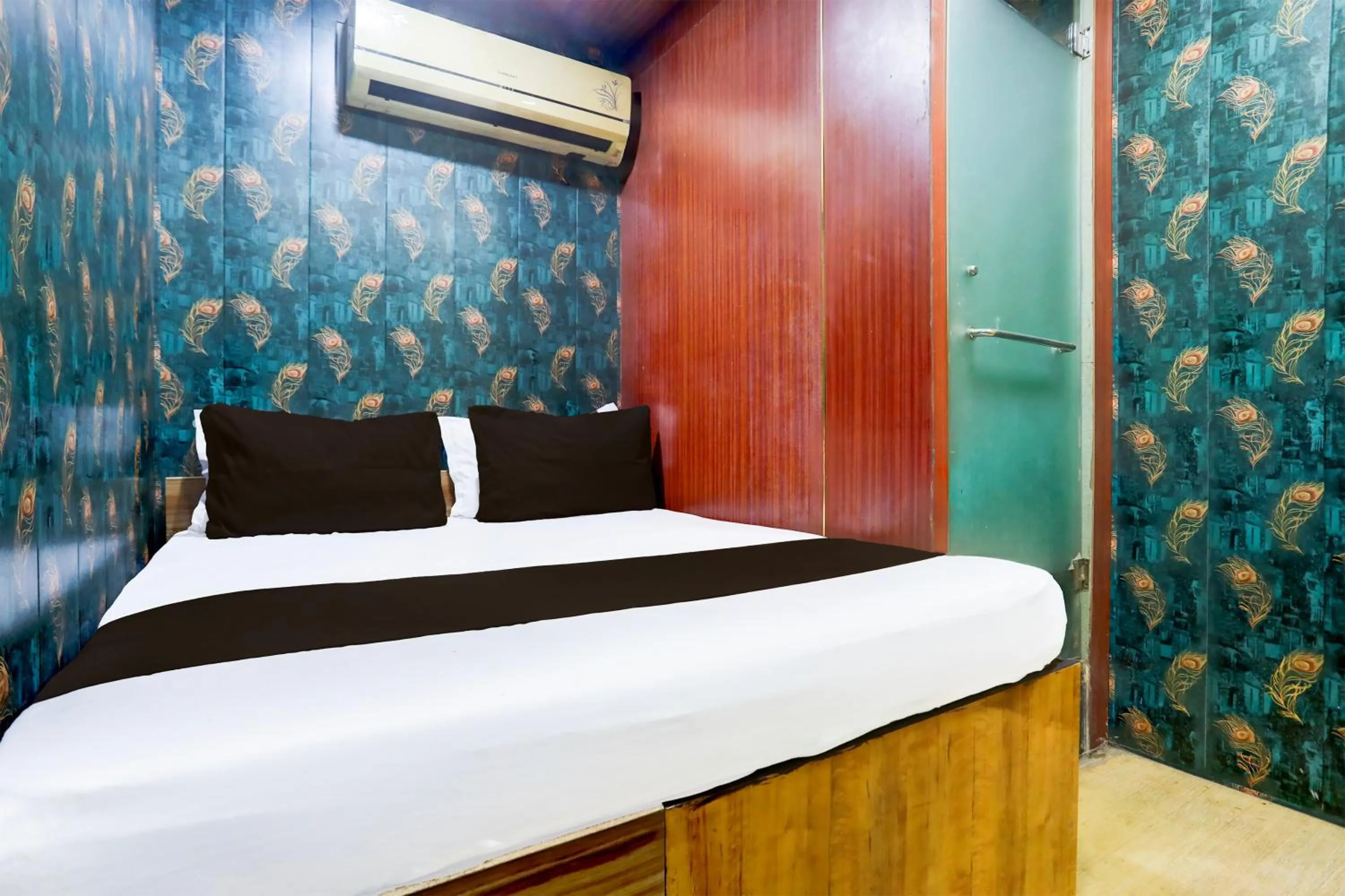 Bedroom in Hotel O A K Residency