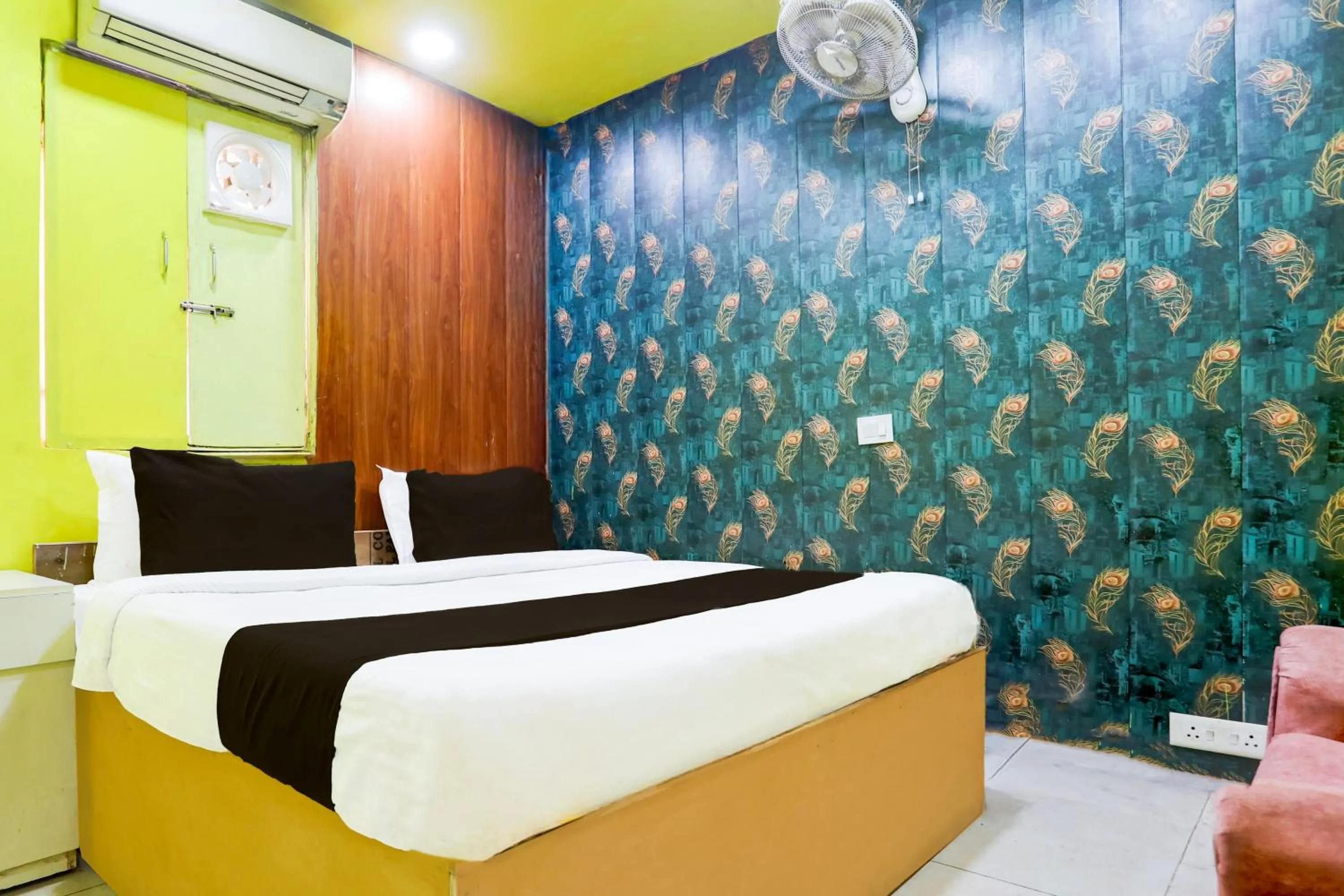 Bedroom in Hotel O A K Residency