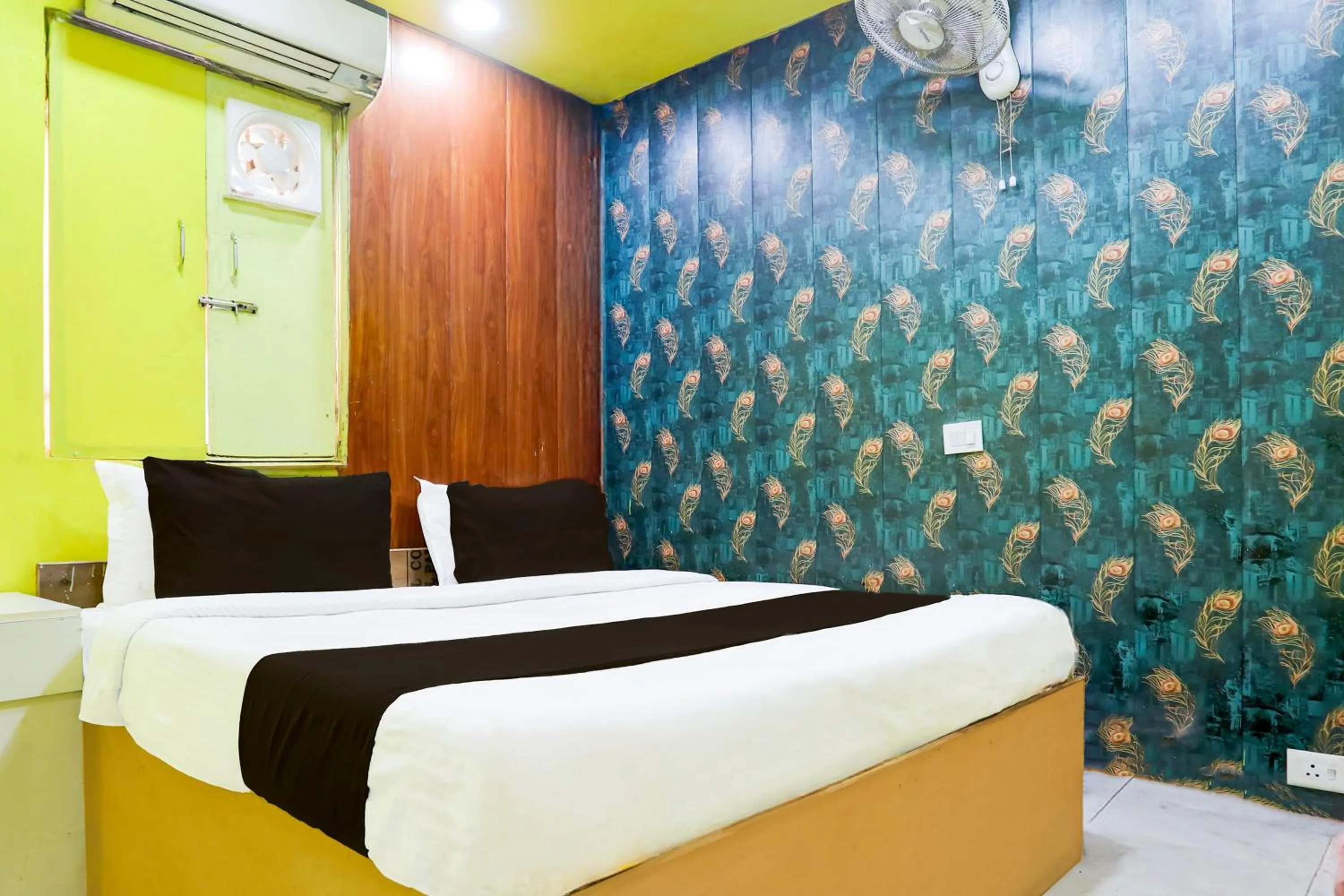 Bedroom in Hotel O A K Residency