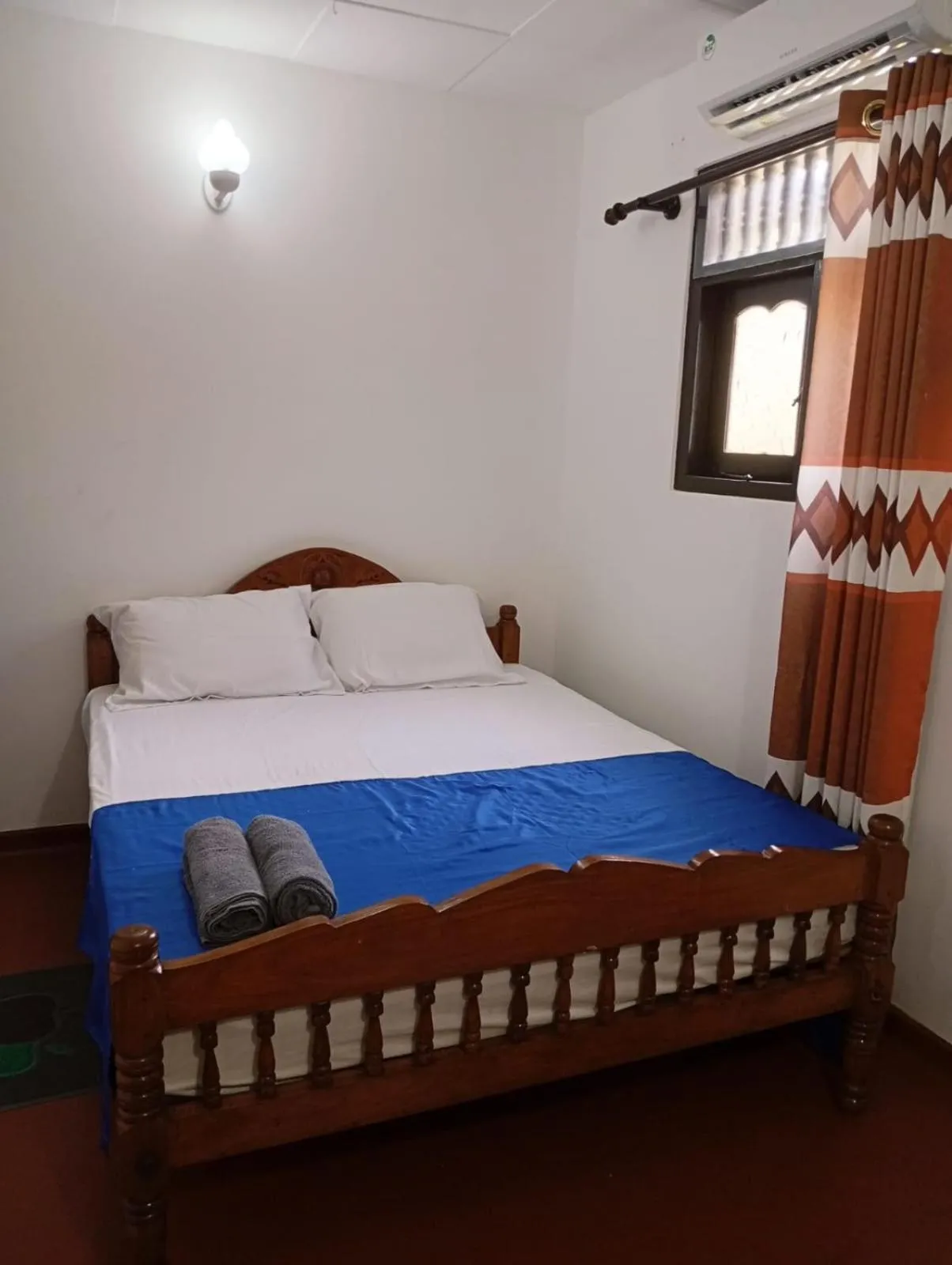 Bed in Ocean View Guest House