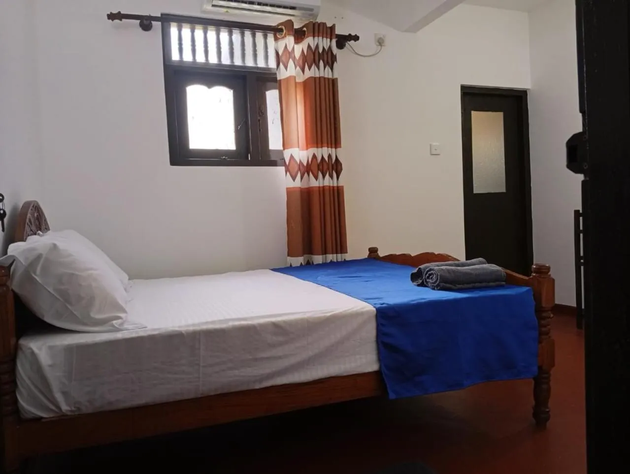 Bed in Ocean View Guest House