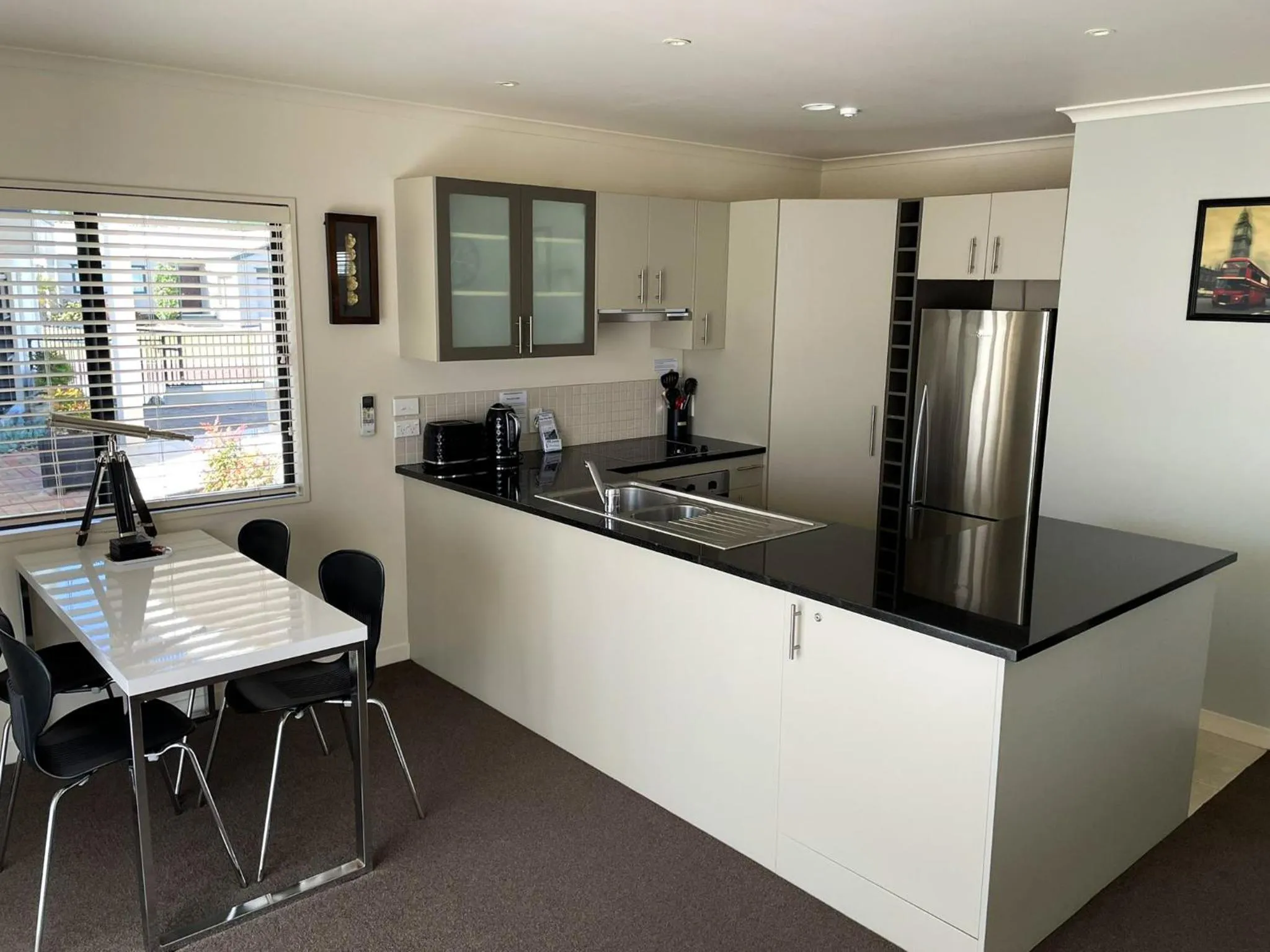 Kitchen or kitchenette in Ocean Breeze Resort Pauanui