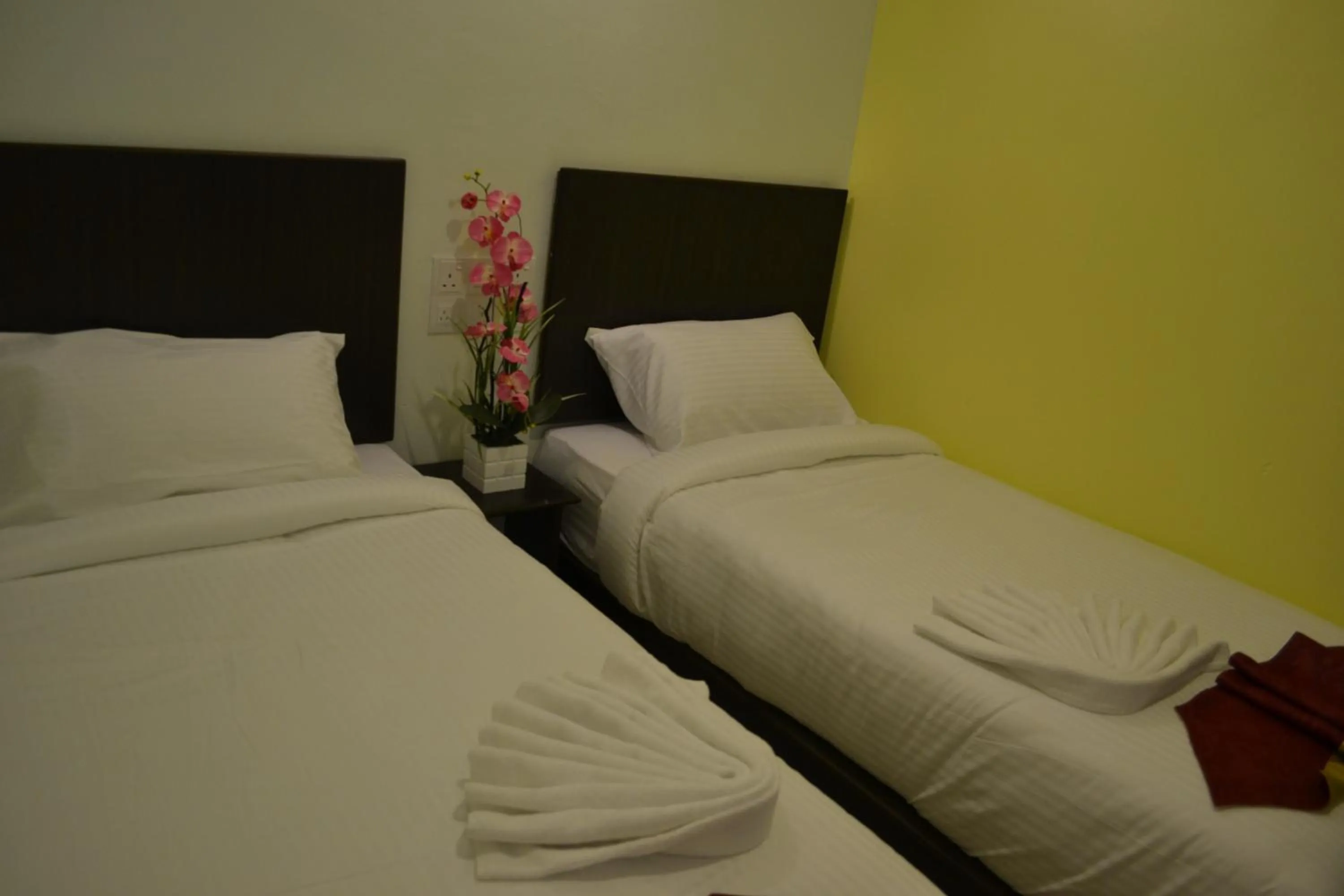 Bed in DR Hotel Penang