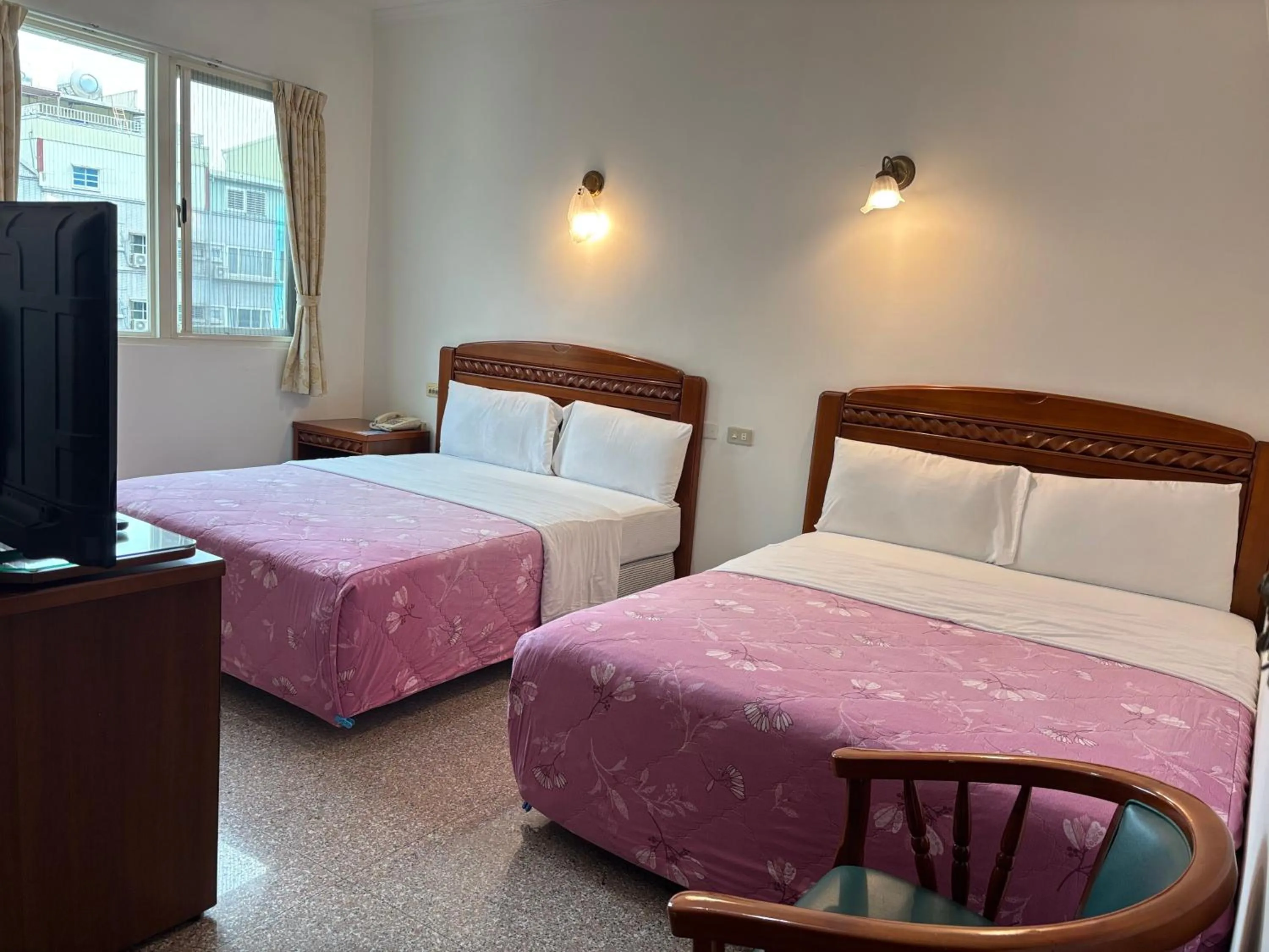 Bed in Chantai Hotel