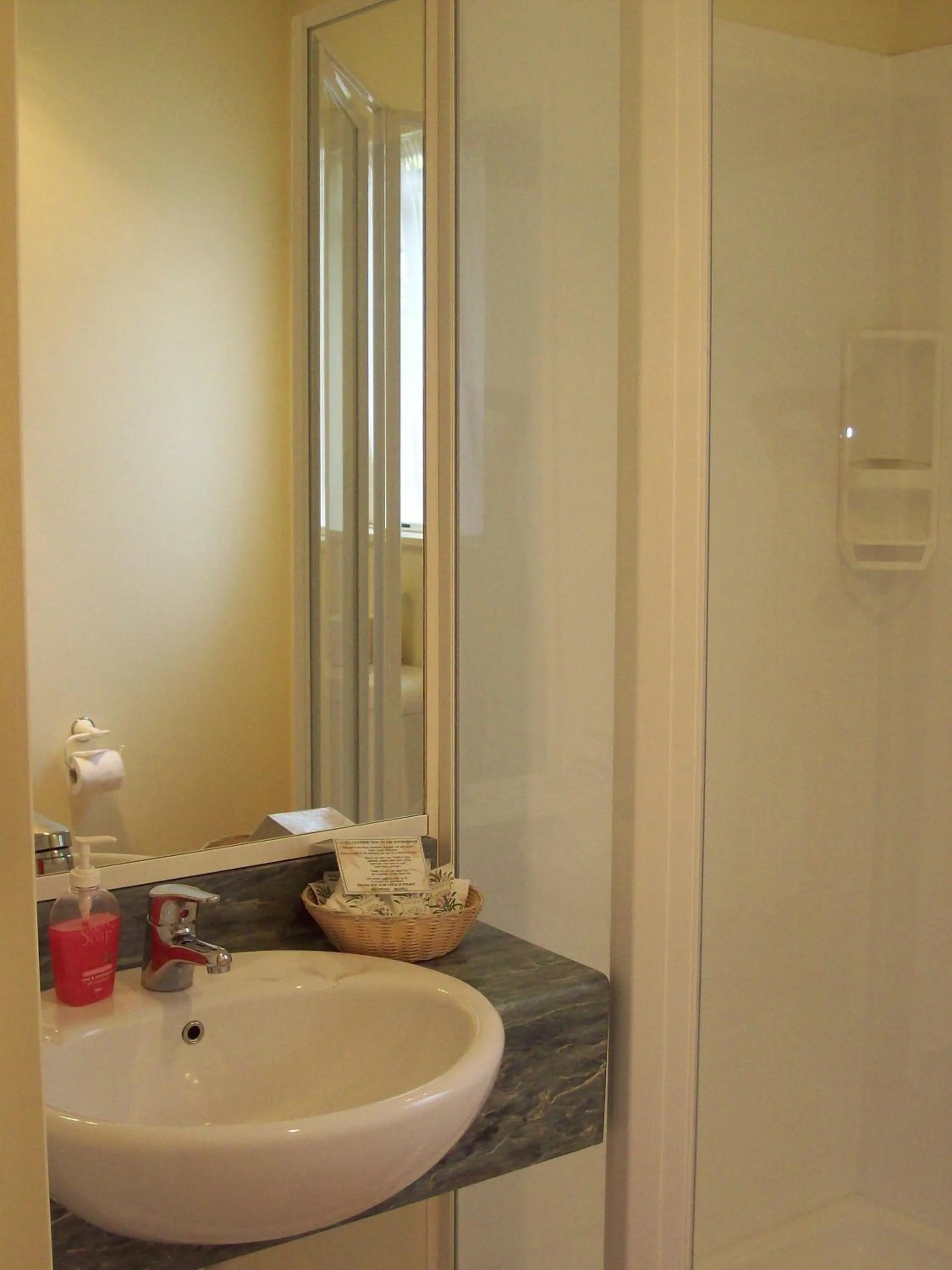 Toilet in Bentons Motel