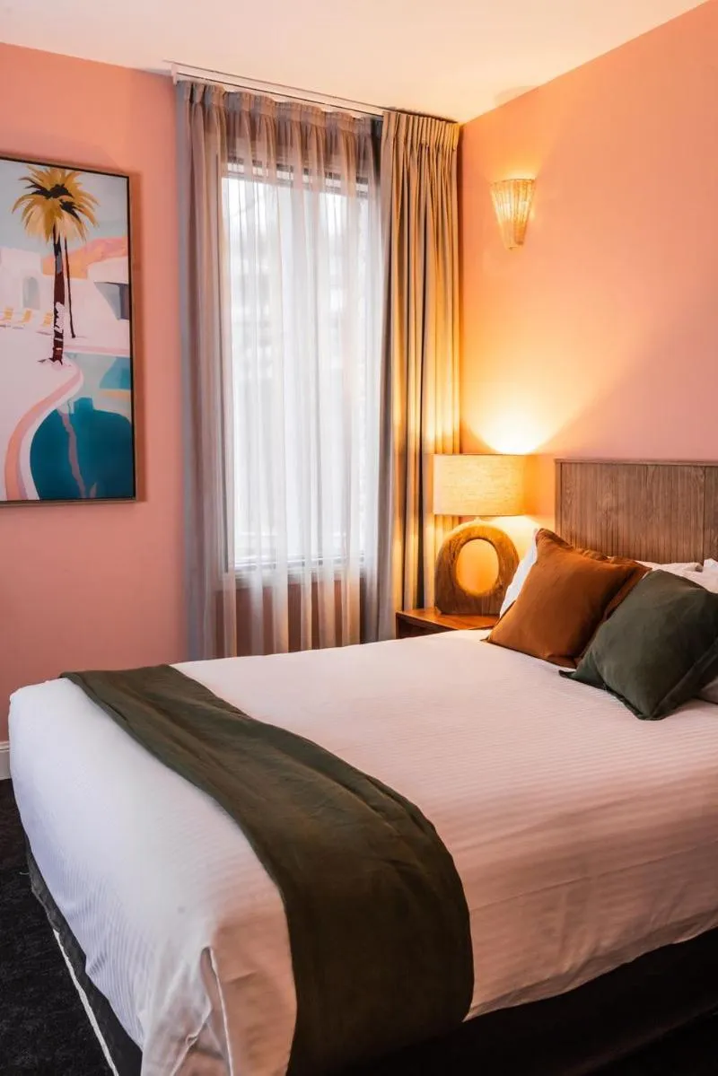 Bed in The Lucky Hotel