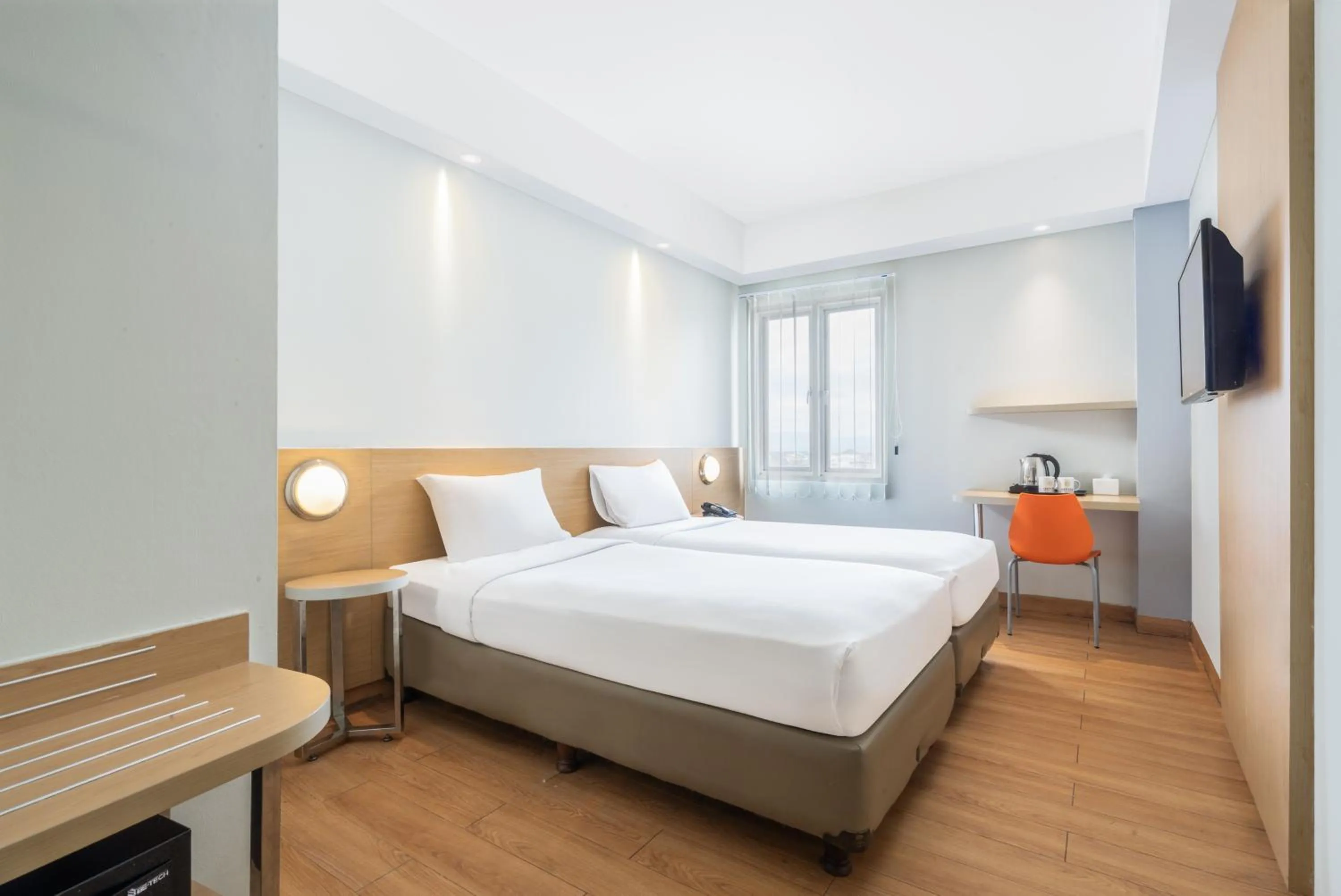 Bed in Indies Style Malioboro Hotel