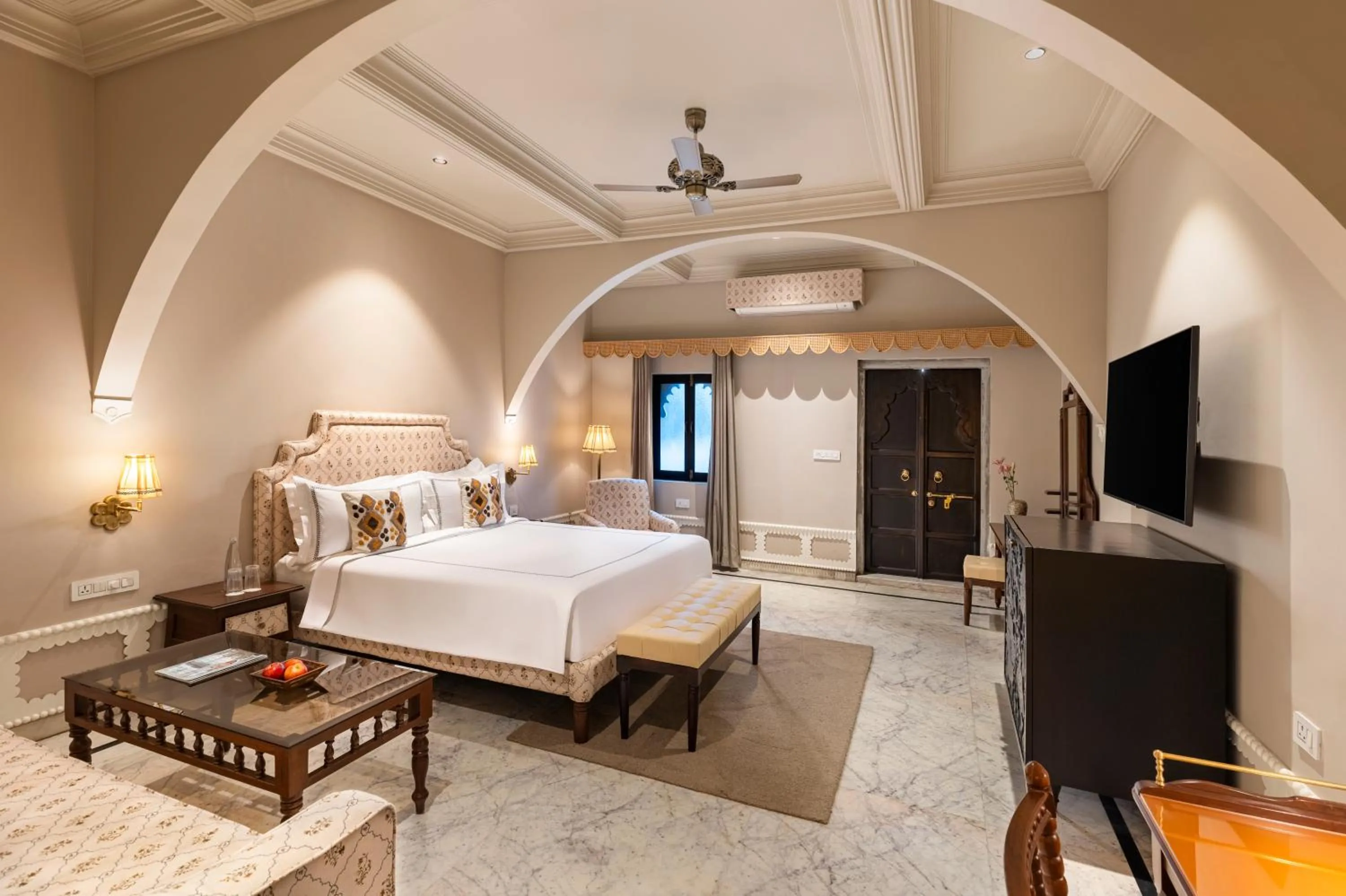 Bed in Daulatgarh Resort