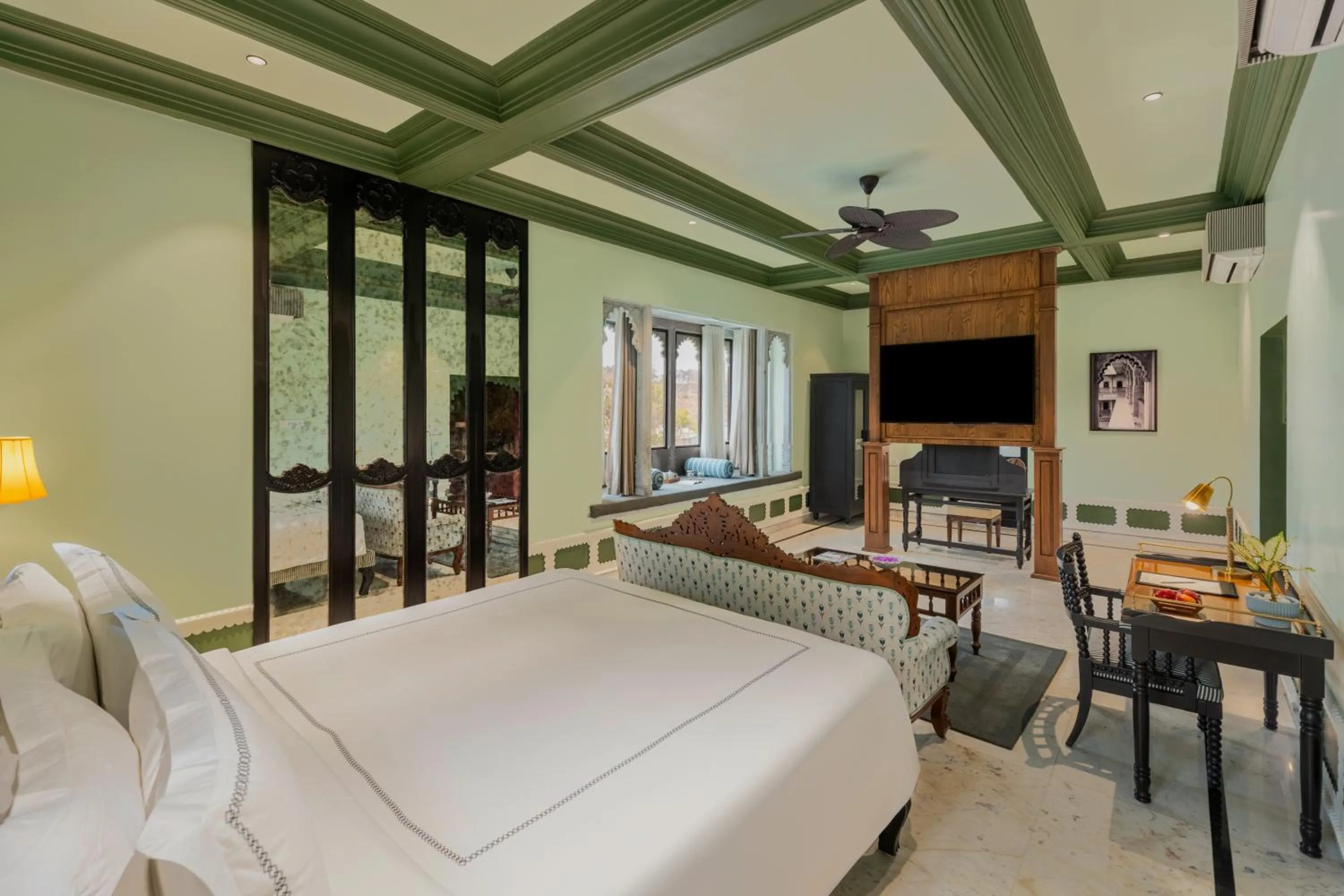 Bed in Daulatgarh Resort