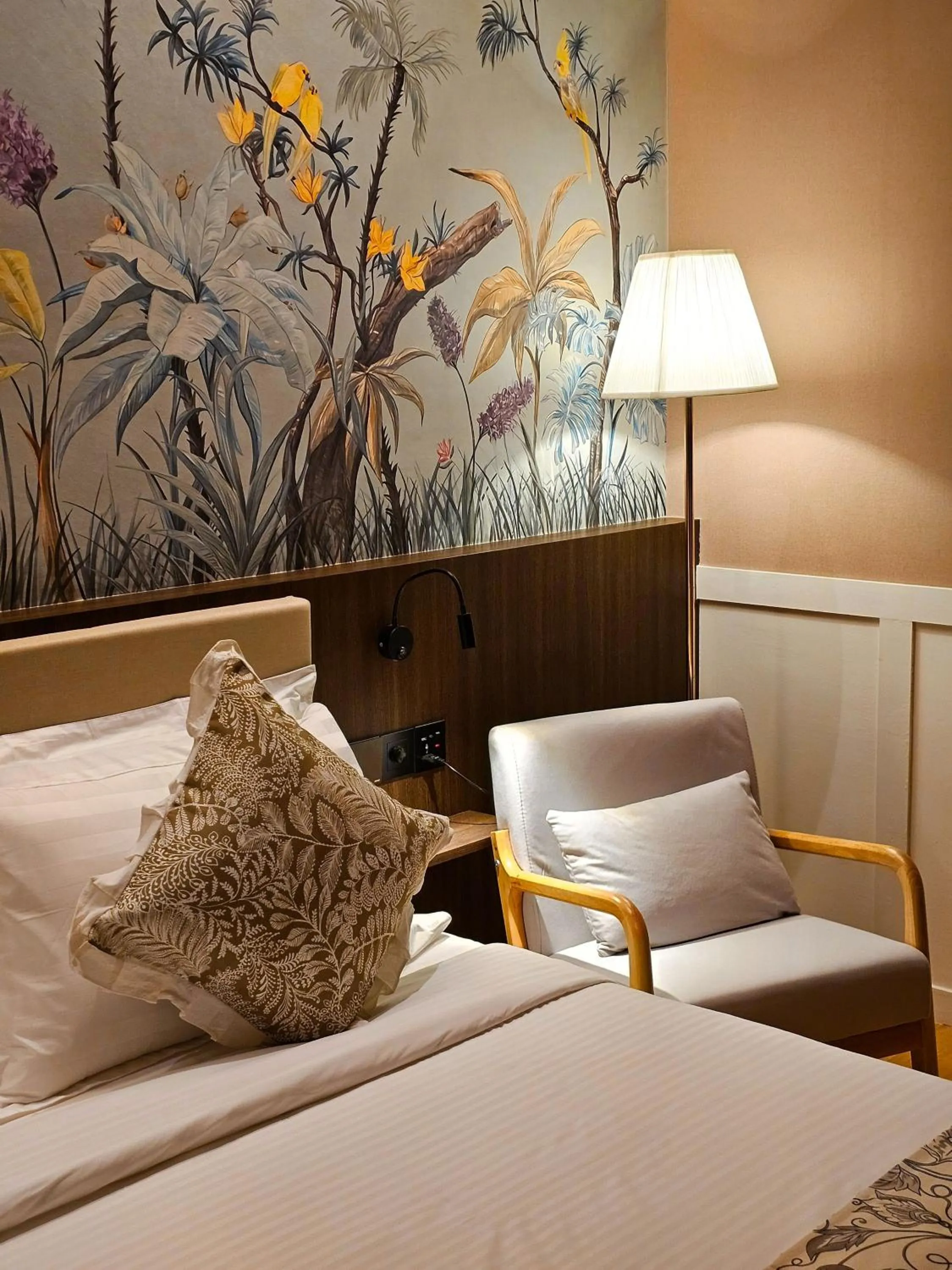 Bed in The Palm Suite at Lava Mansion