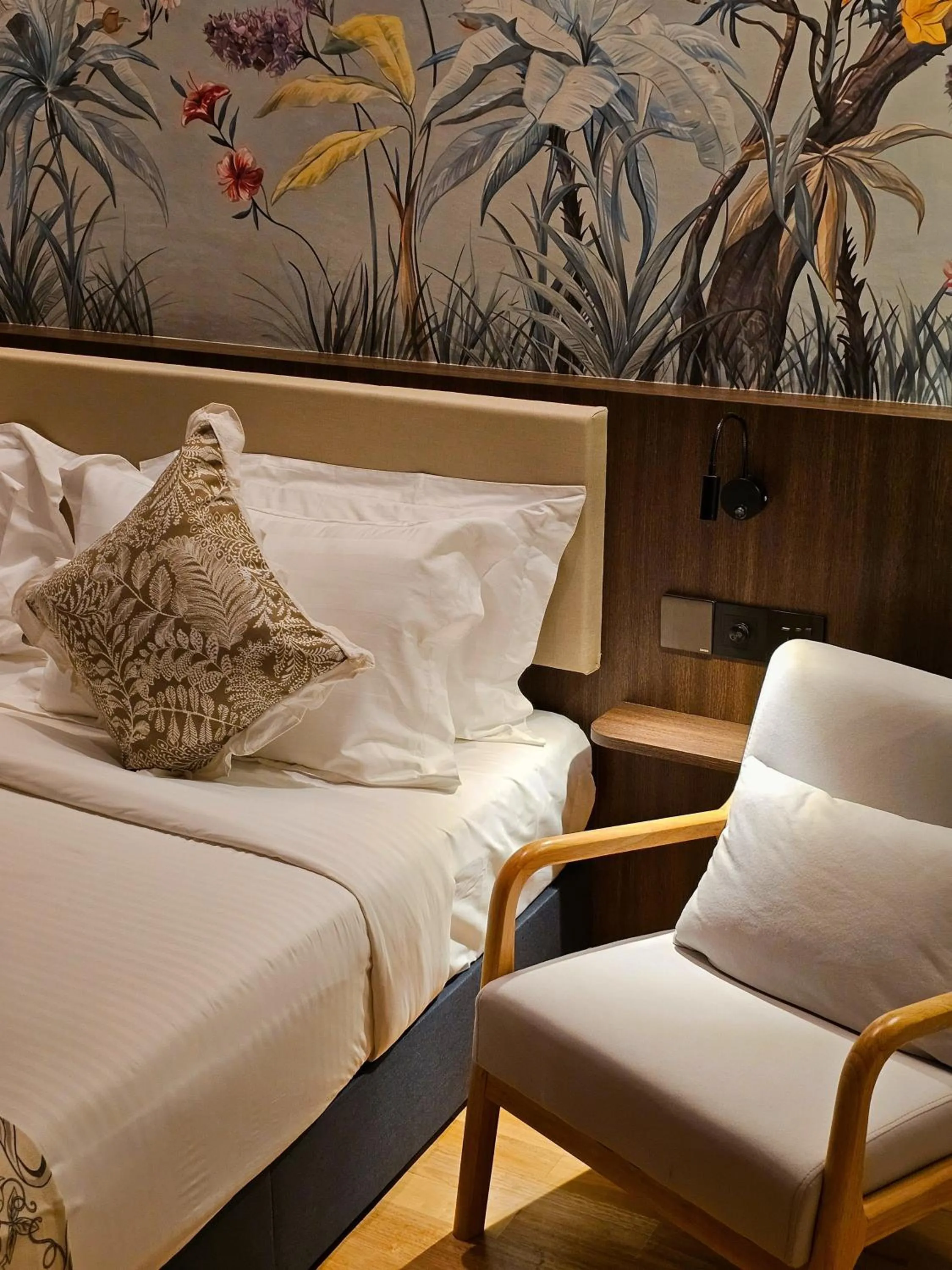 Bed in The Palm Suite at Lava Mansion