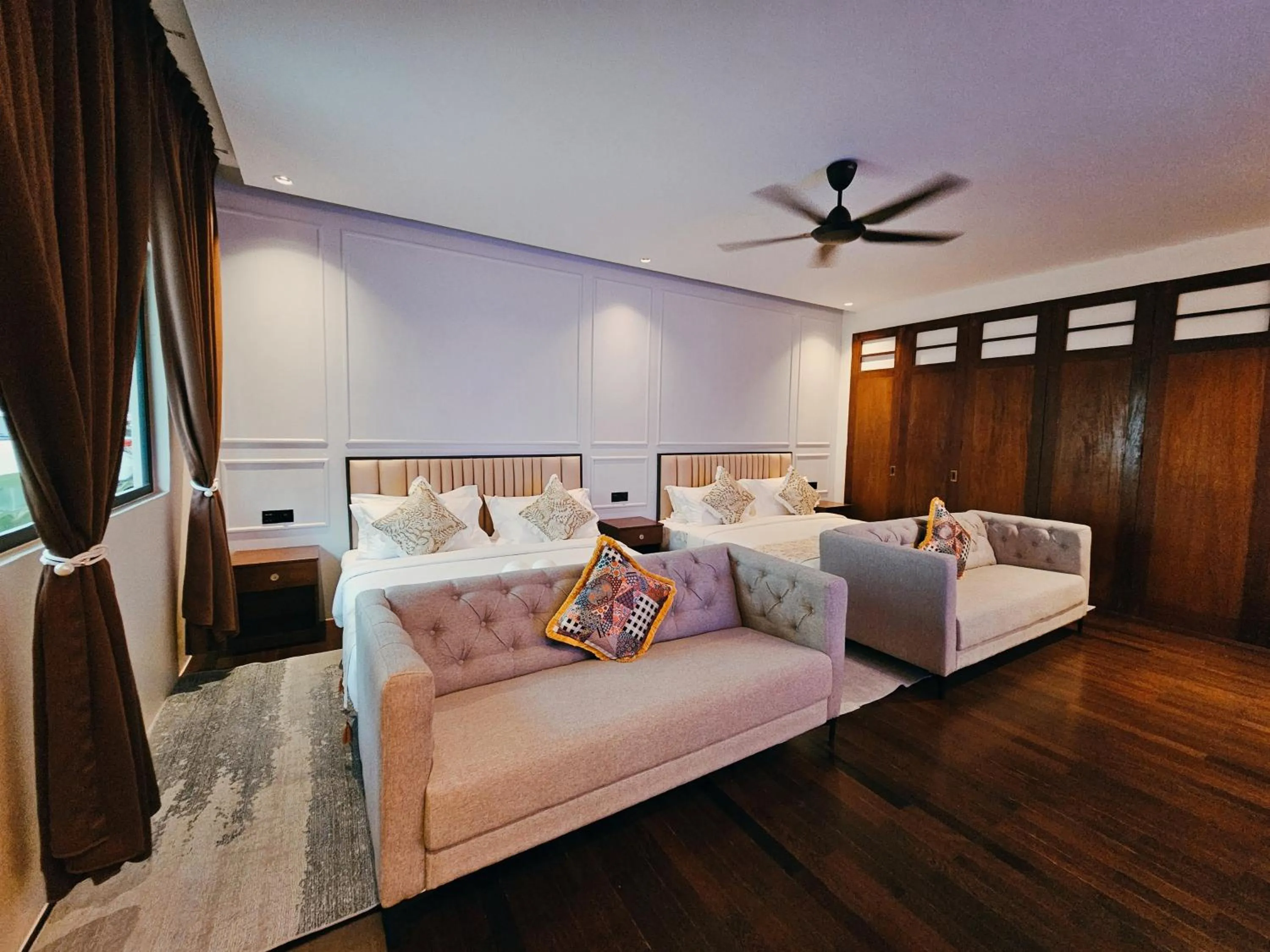 Bed in The Palm Suite at Lava Mansion