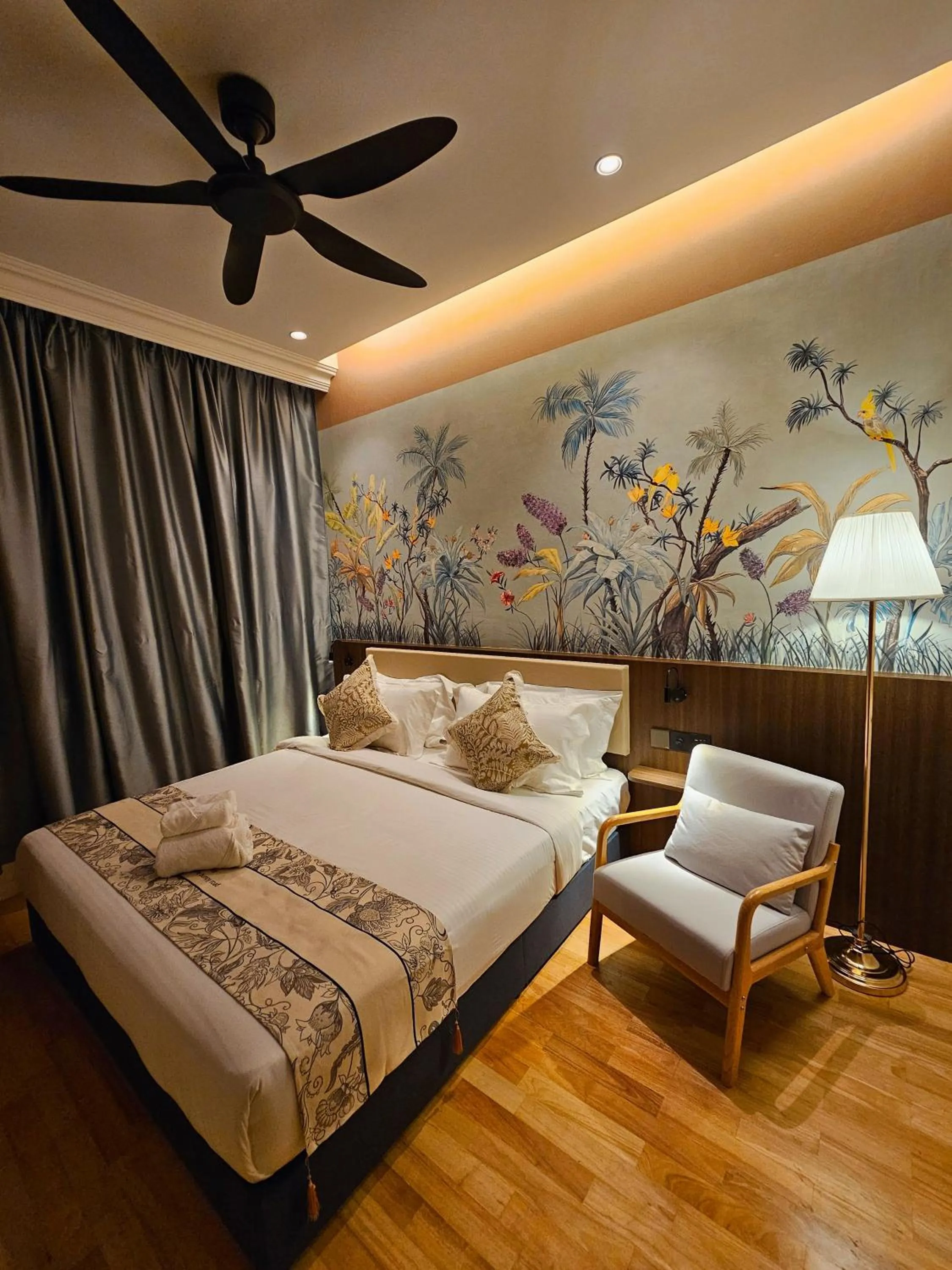 Bed in The Palm Suite at Lava Mansion