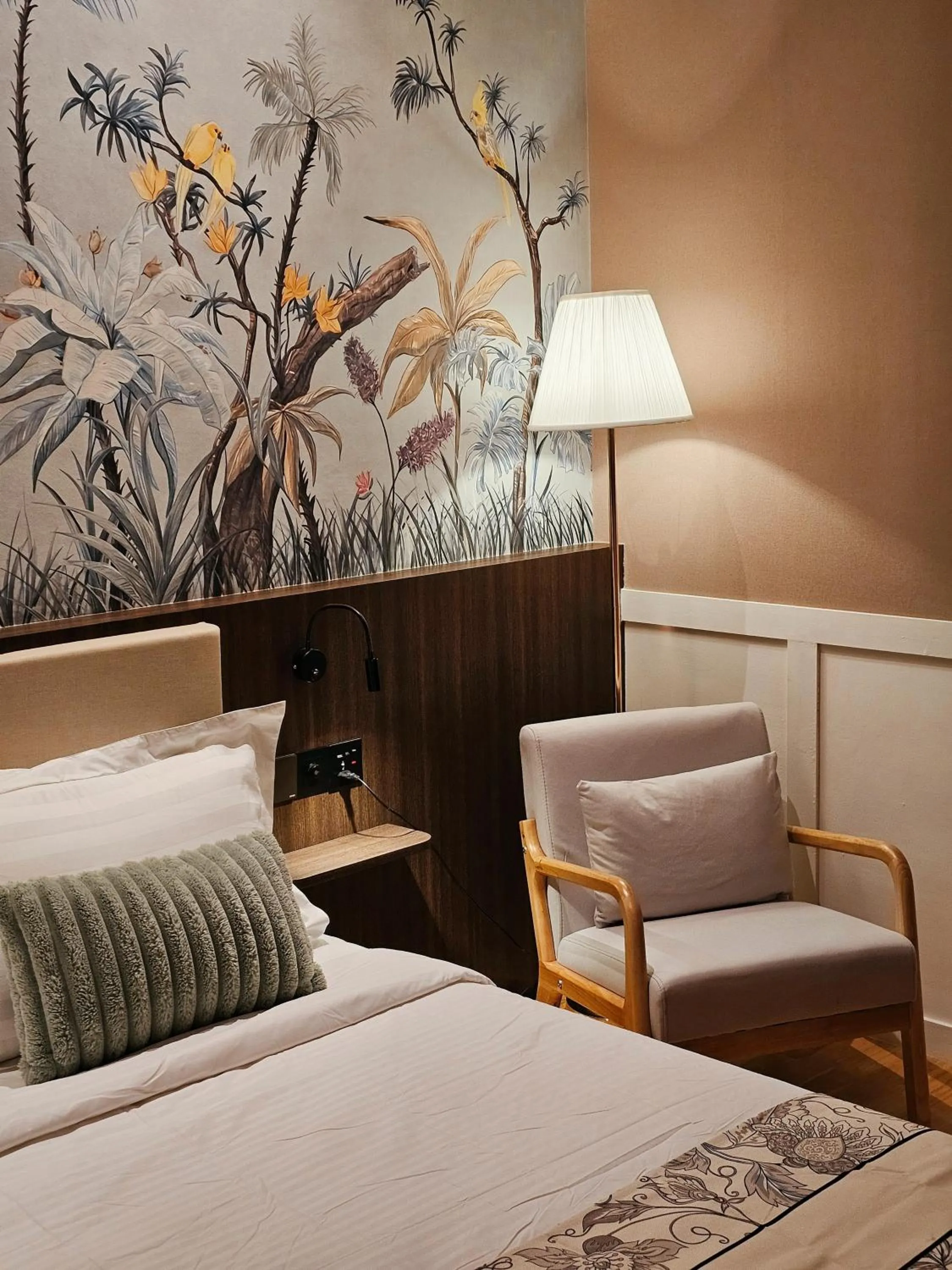 Bed in The Palm Suite at Lava Mansion