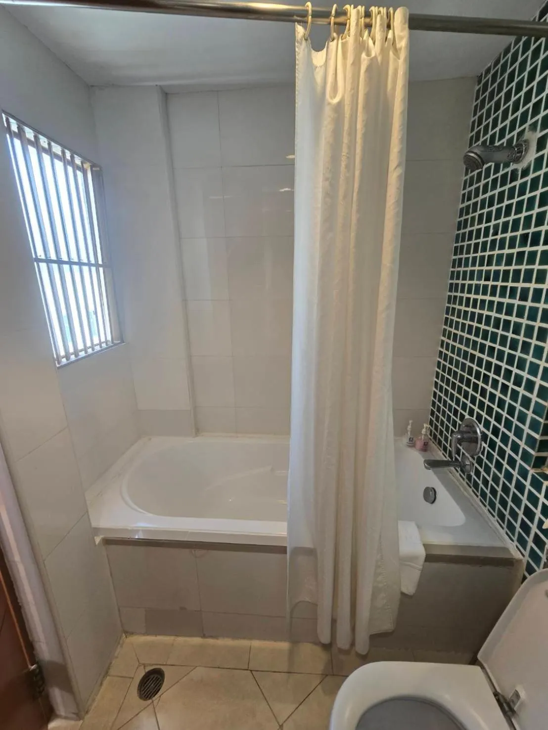 Bathroom in Riverside Bangkok Hotel