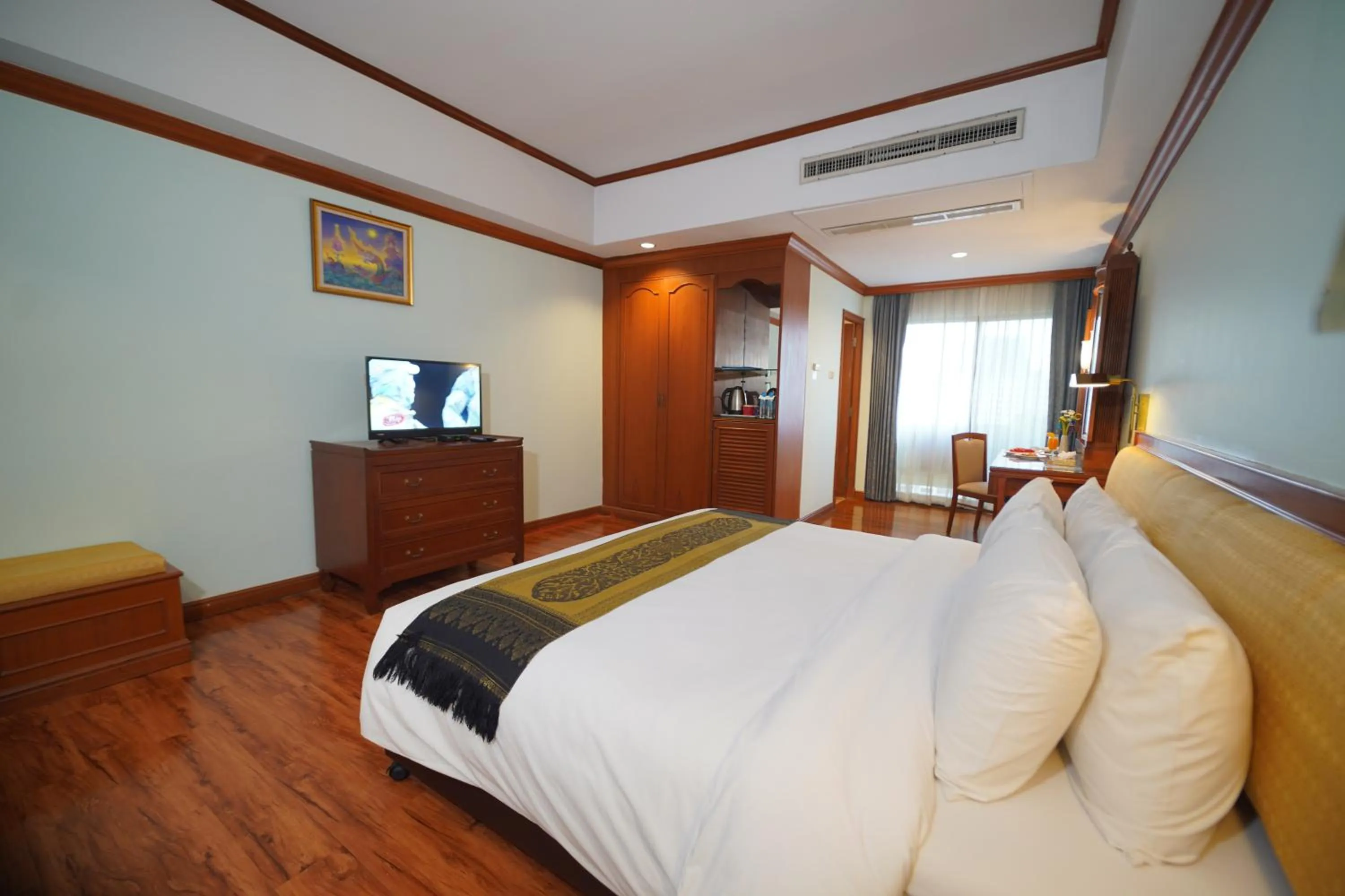 Photo of the whole room in Riverside Bangkok Hotel