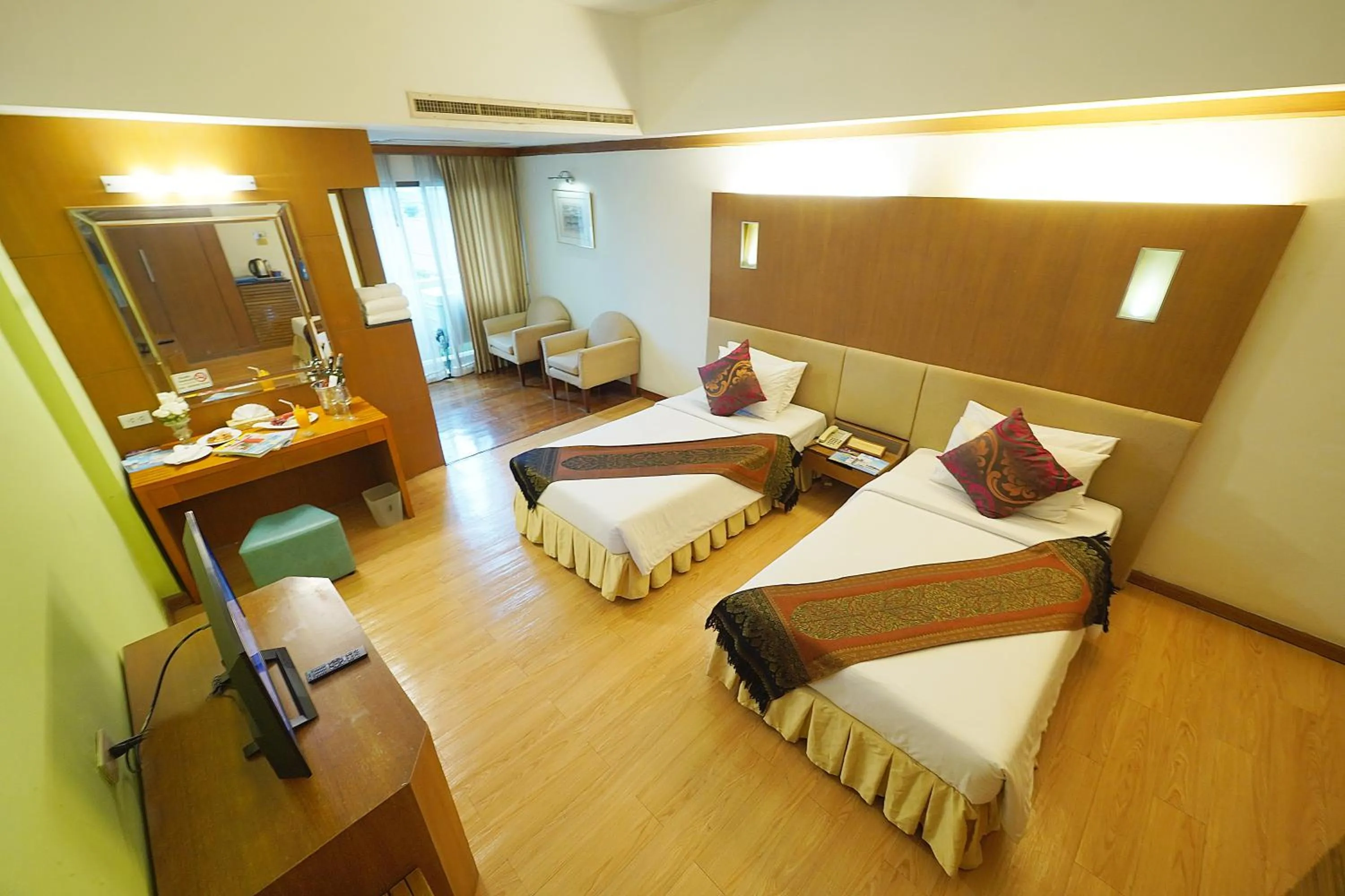 Bed in Riverside Bangkok Hotel