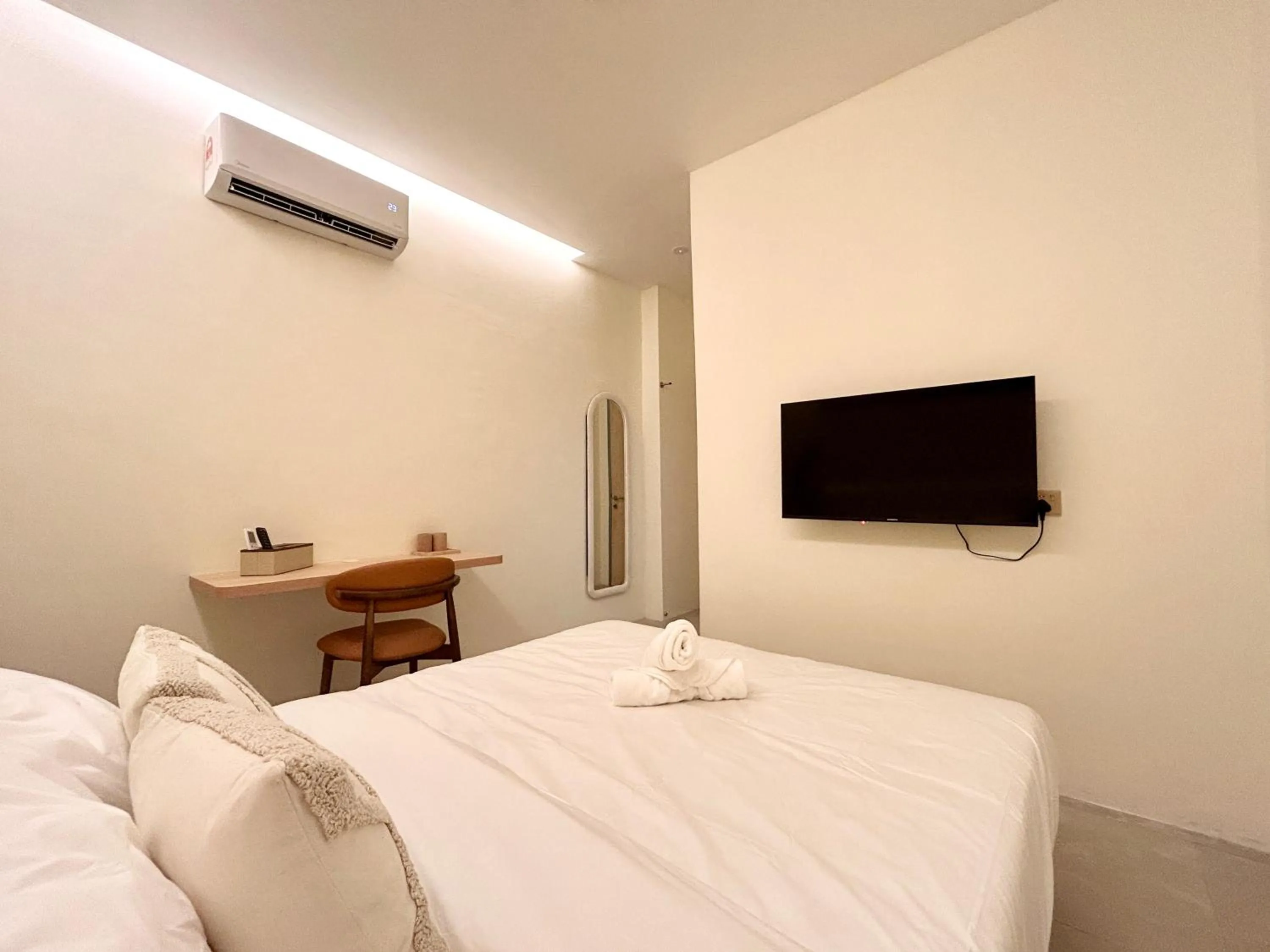 Bed in ONE18 Boutique Hotel