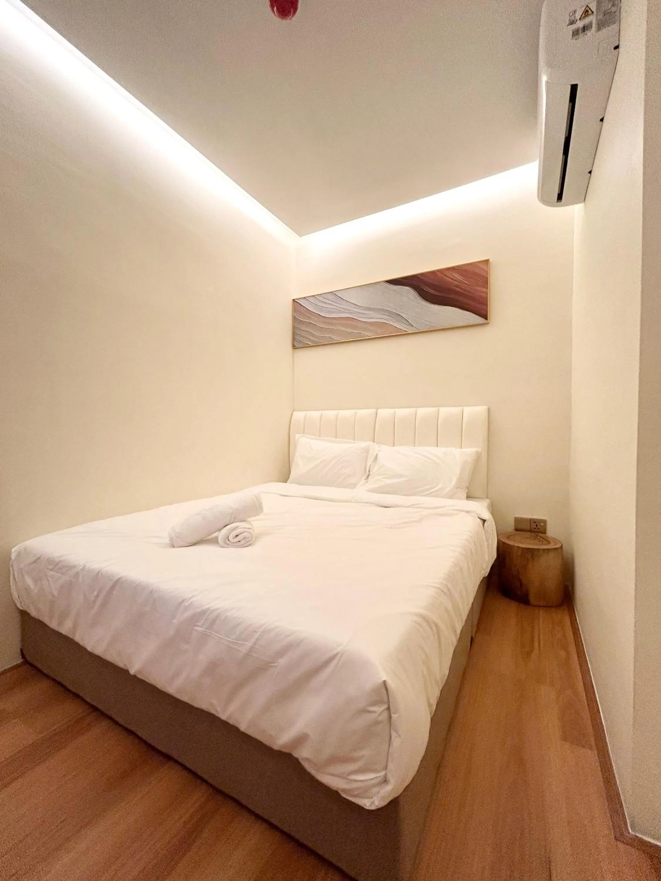 Bed in ONE18 Boutique Hotel