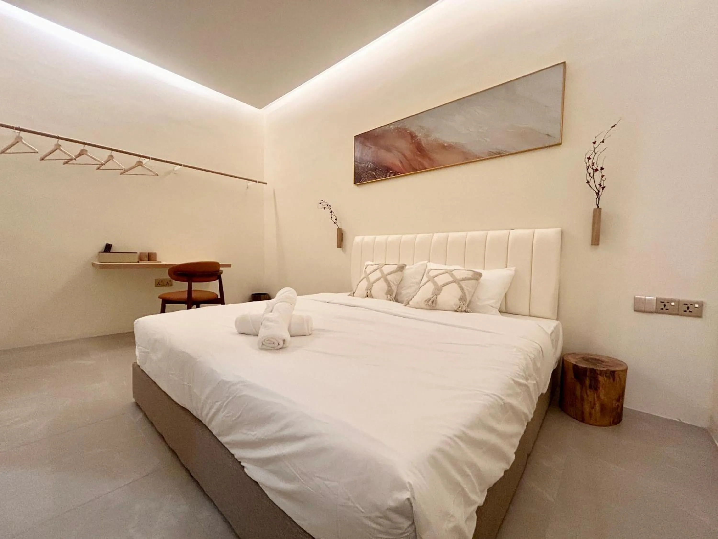 Bed in ONE18 Boutique Hotel