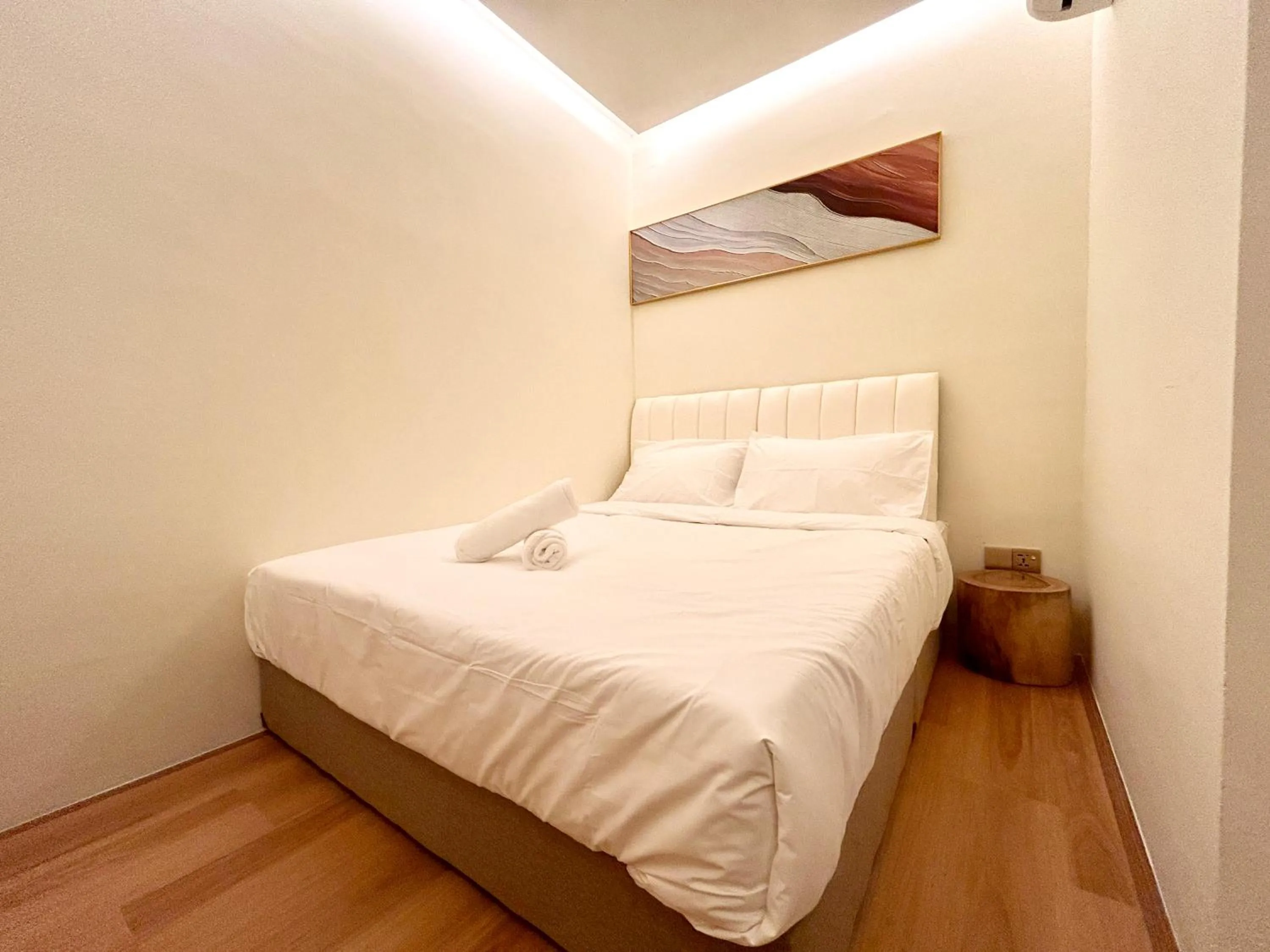 Bed in ONE18 Boutique Hotel