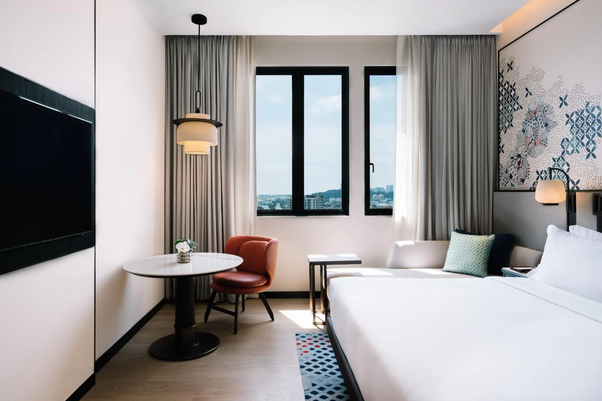 Bed in Iconic Marjorie Hotel, Penang, a Tribute Portfolio Hotel