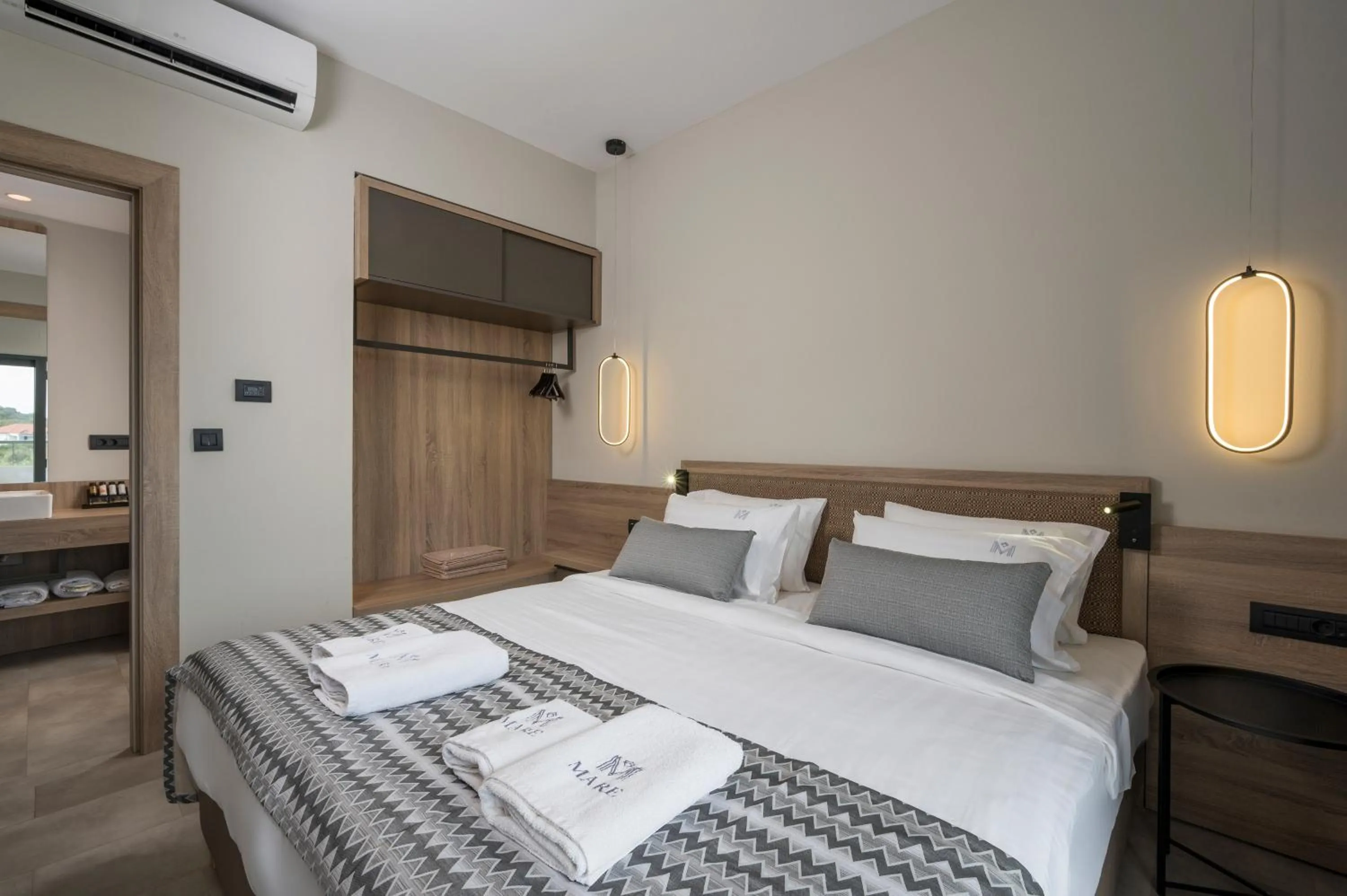 Bed in Mare Village Hotel