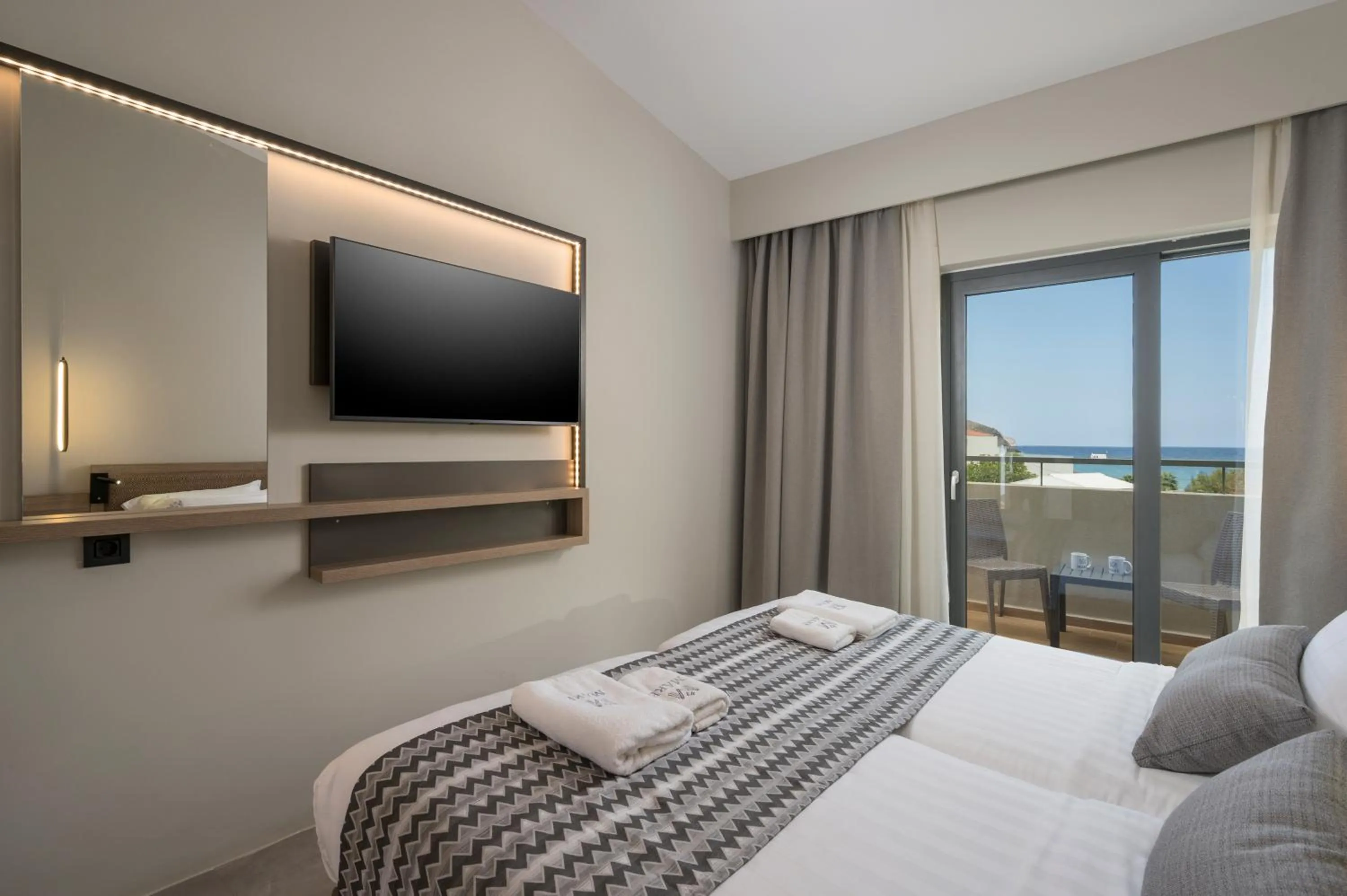 Bed in Mare Village Hotel