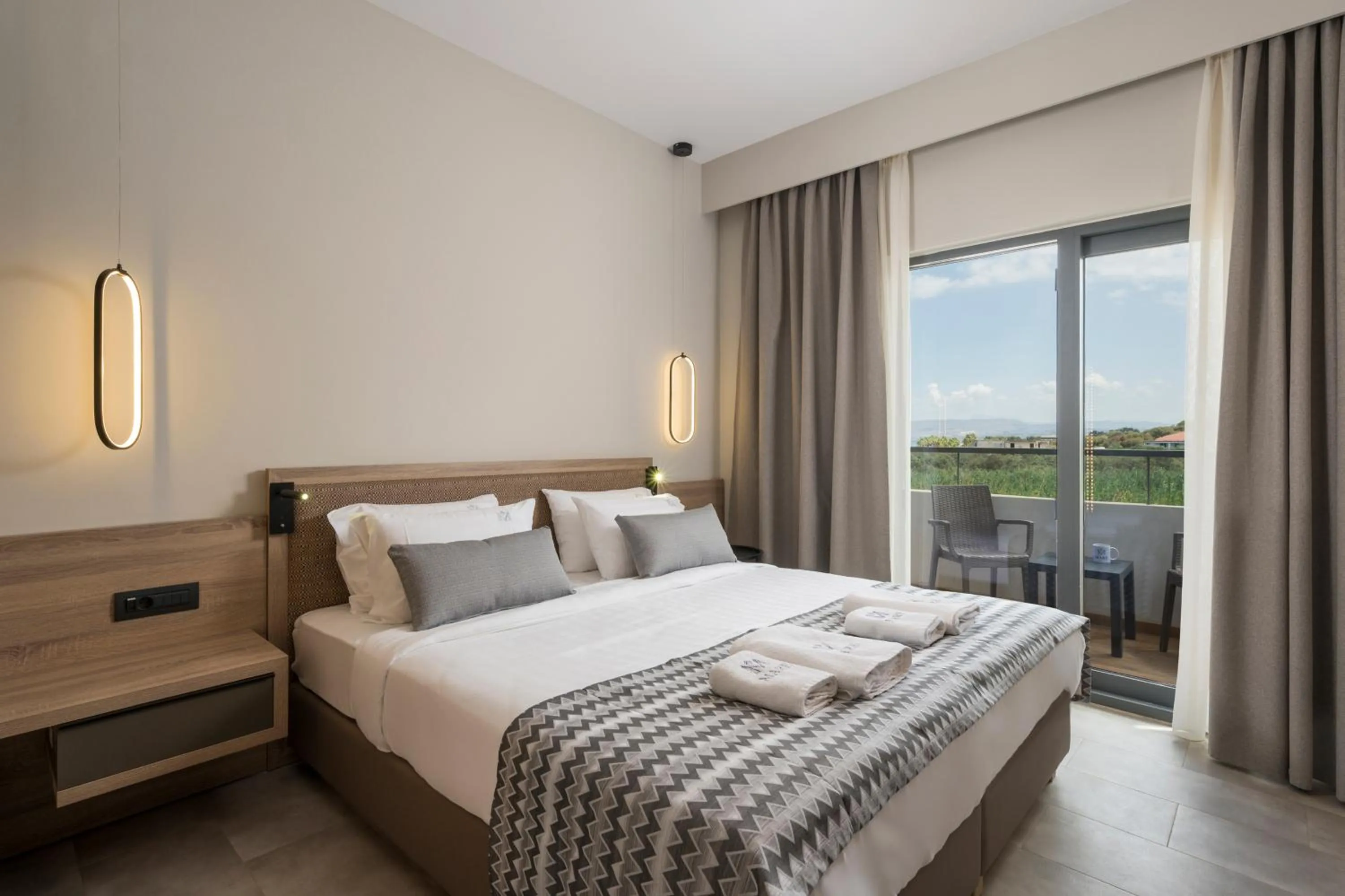 Bed in Mare Village Hotel