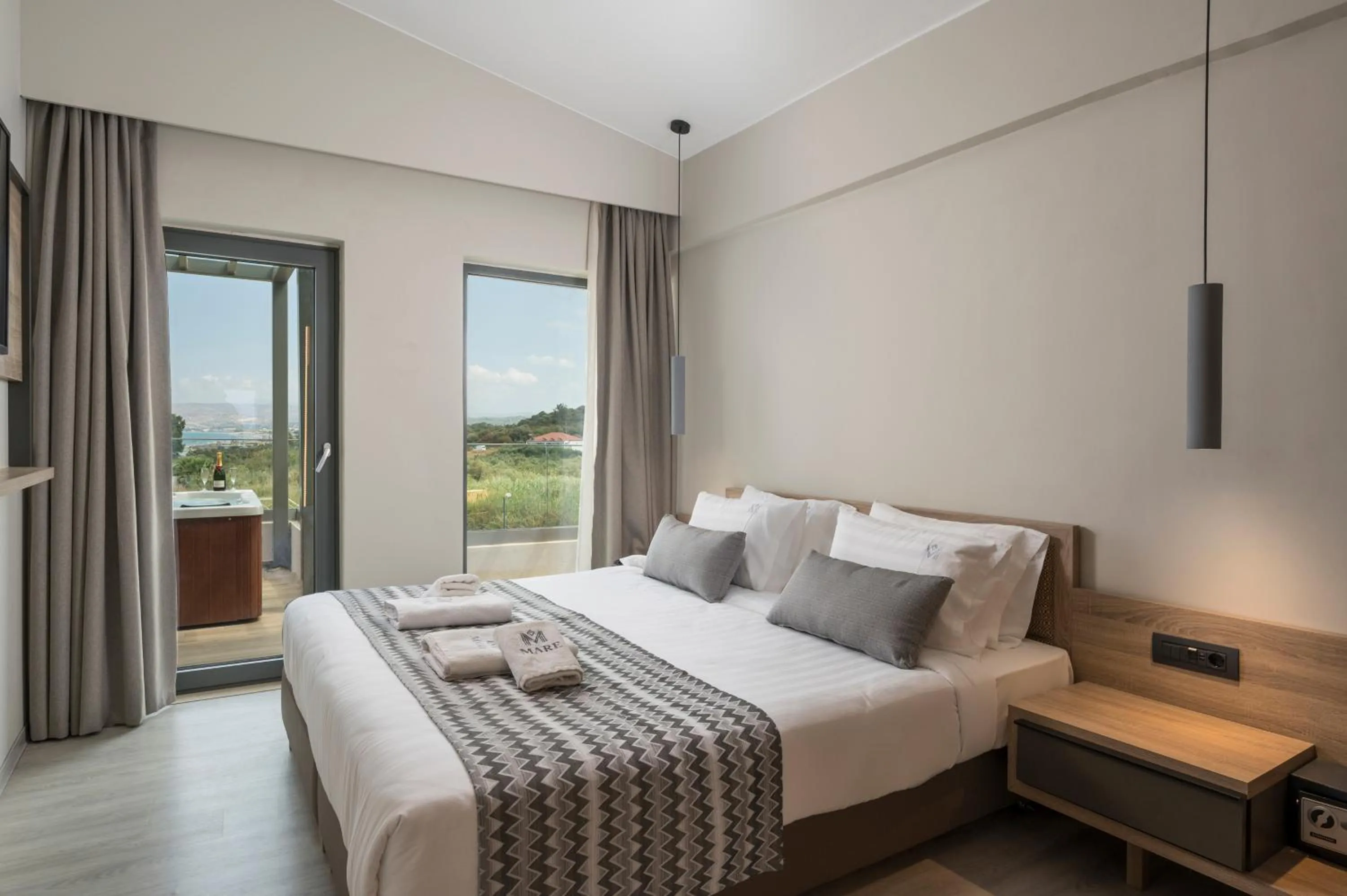 Bed in Mare Village Hotel