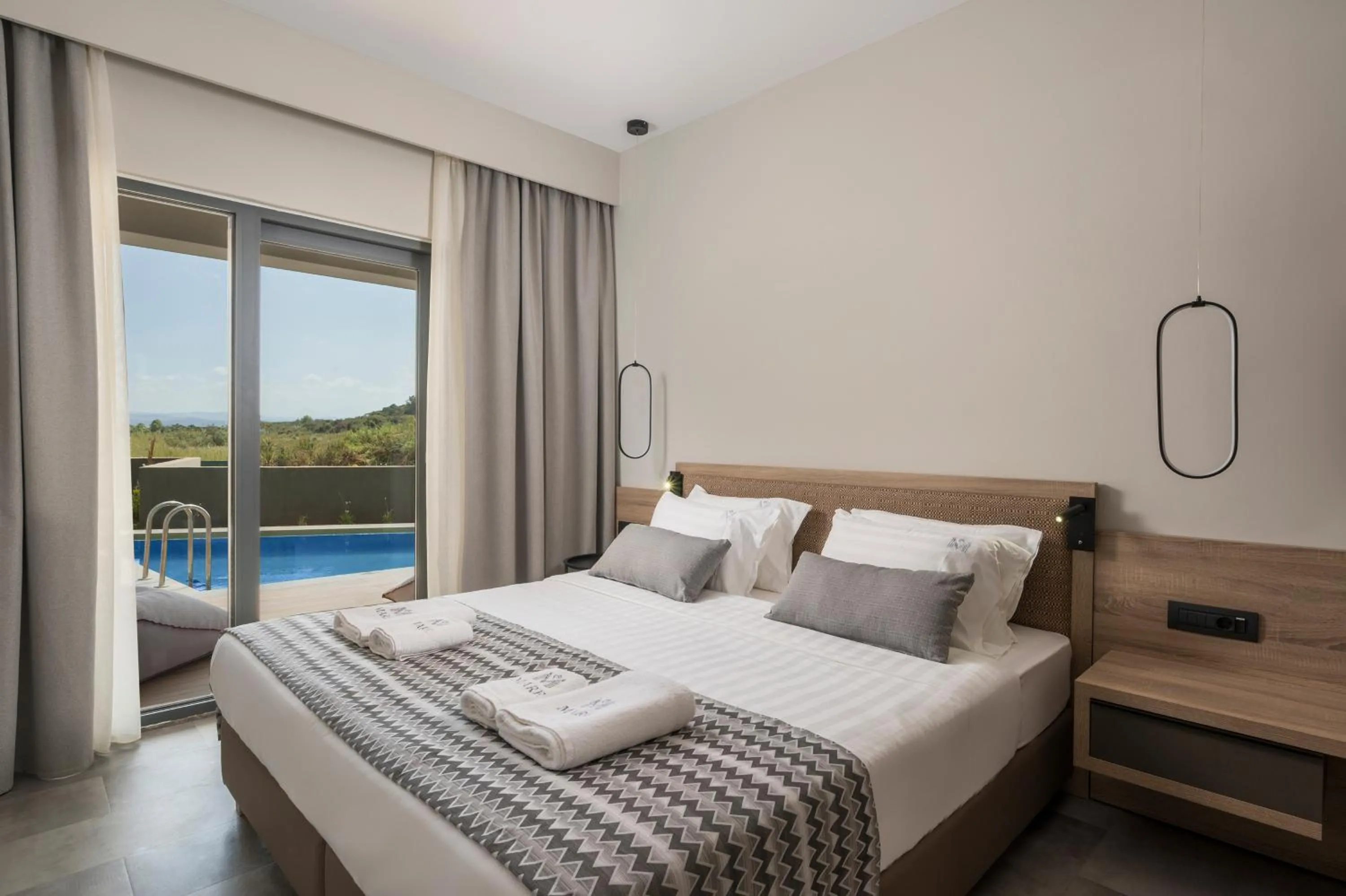 Bed in Mare Village Hotel