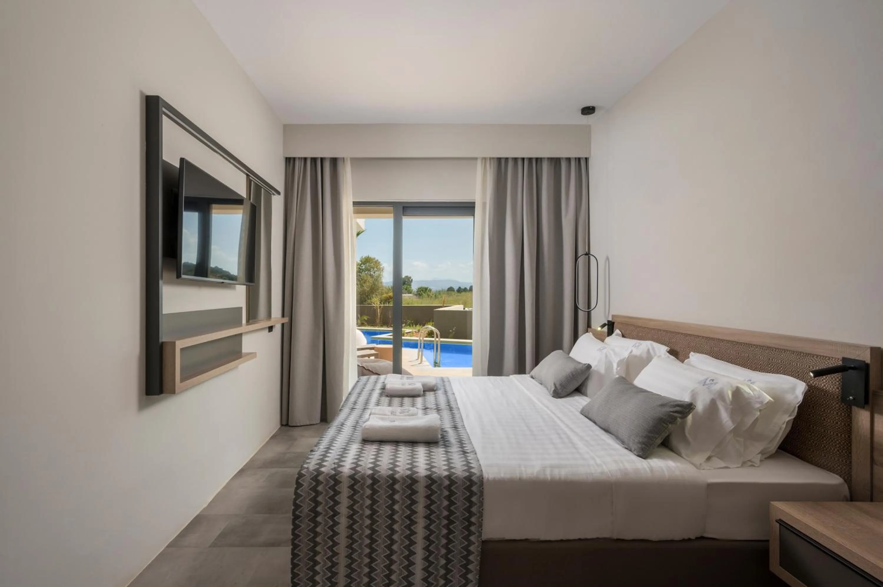 Bed in Mare Village Hotel