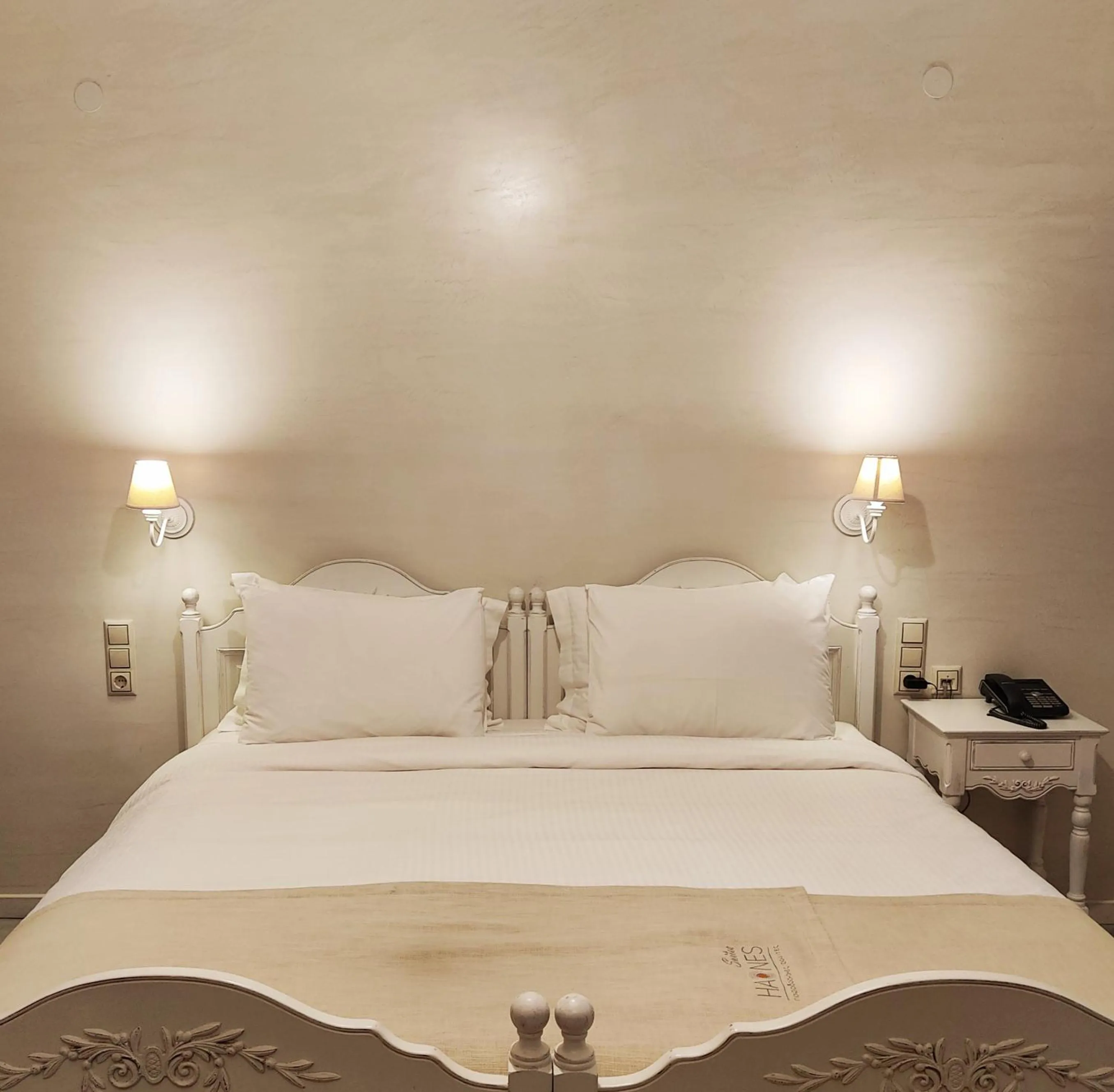 Bed in Haones Suites