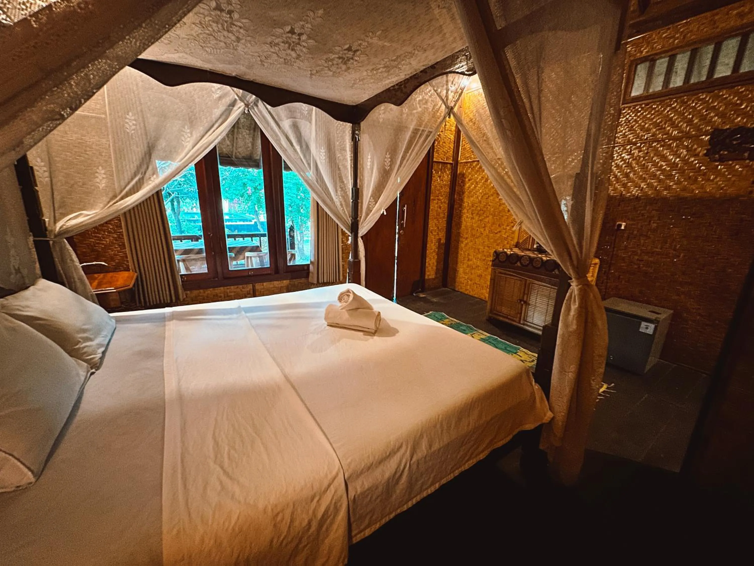 Bed in Sejuk Cottages