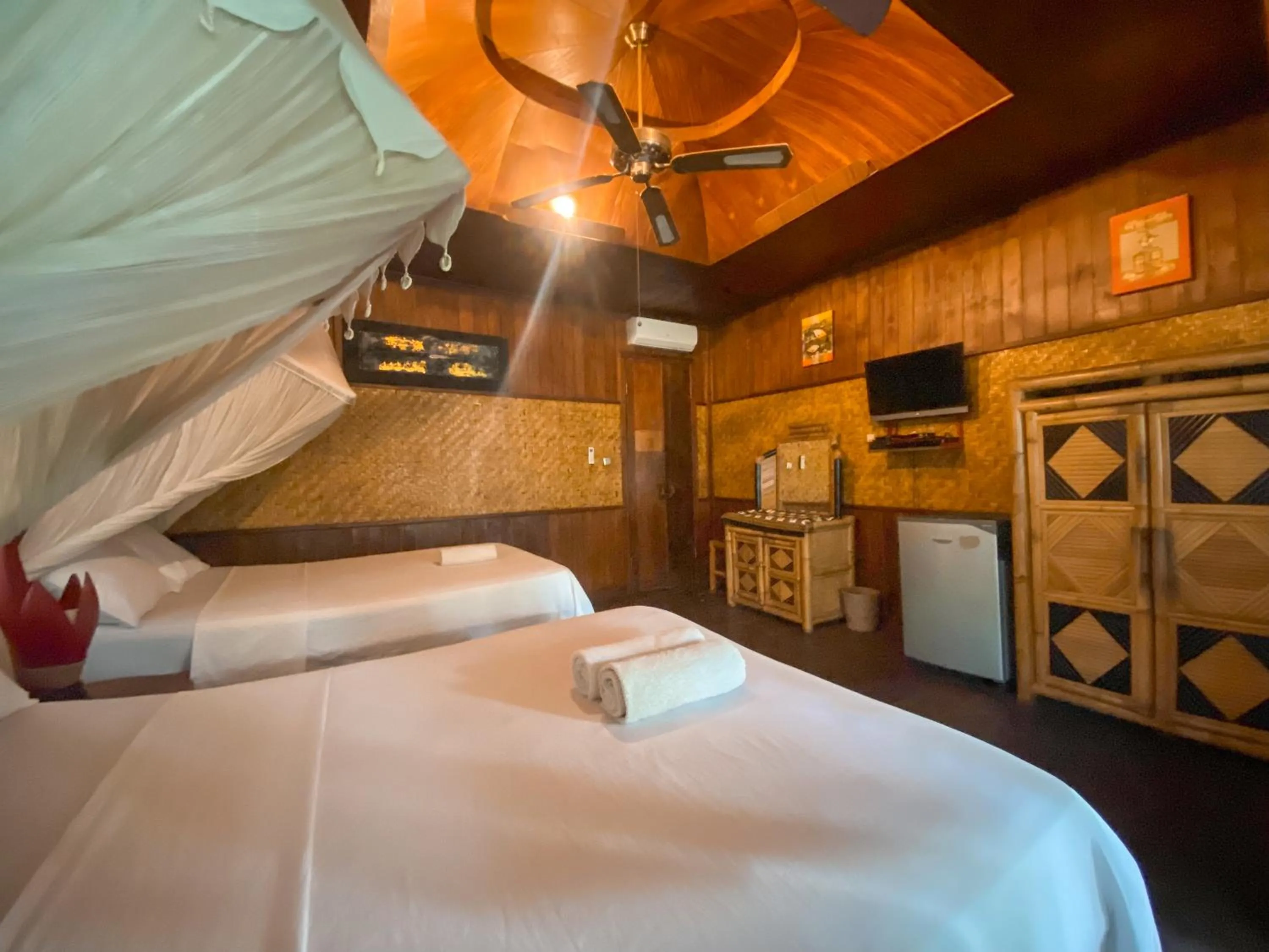 Bed in Sejuk Cottages