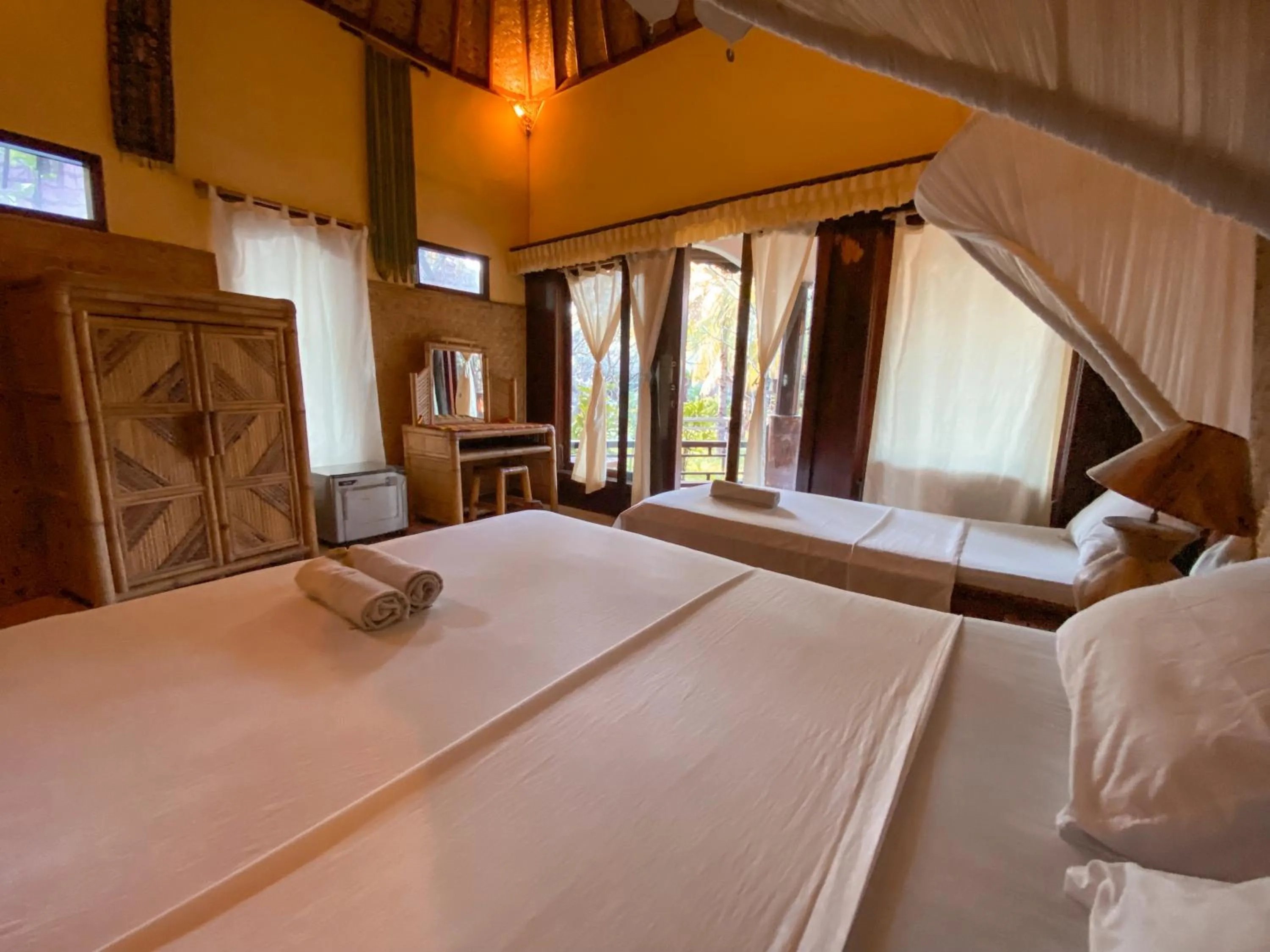 Bed in Sejuk Cottages