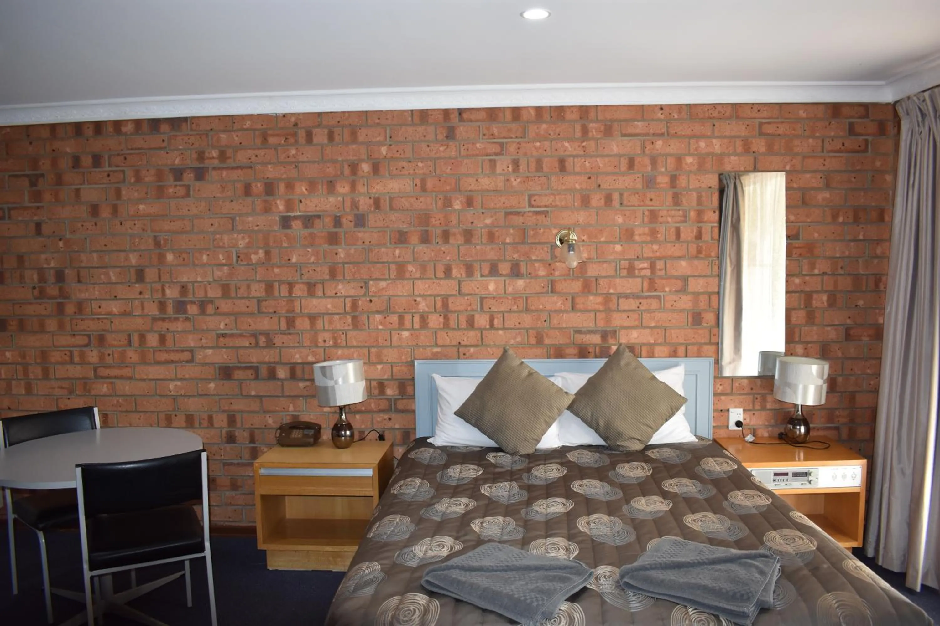 Bed in Roundhouse Motel