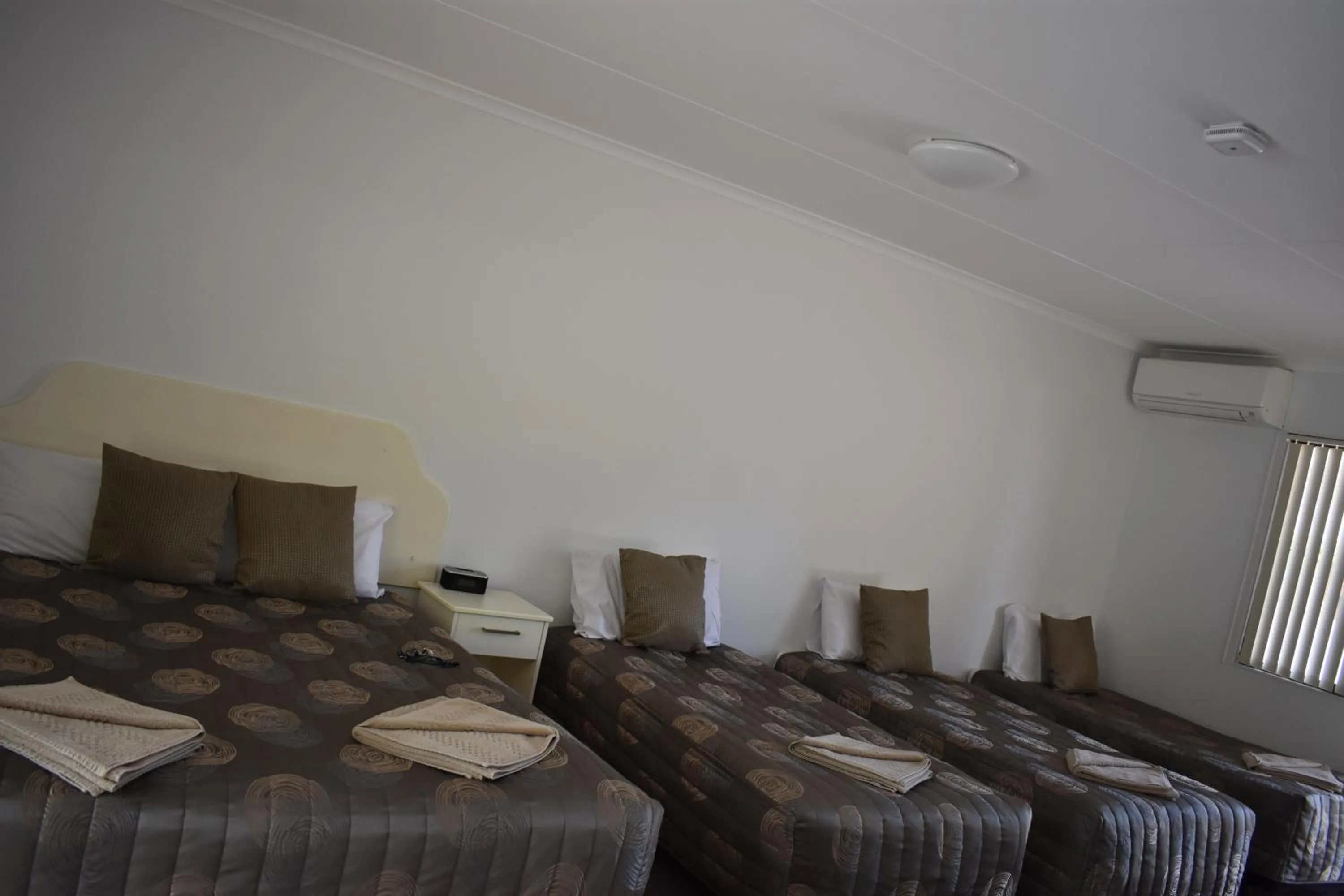 Bed in Roundhouse Motel