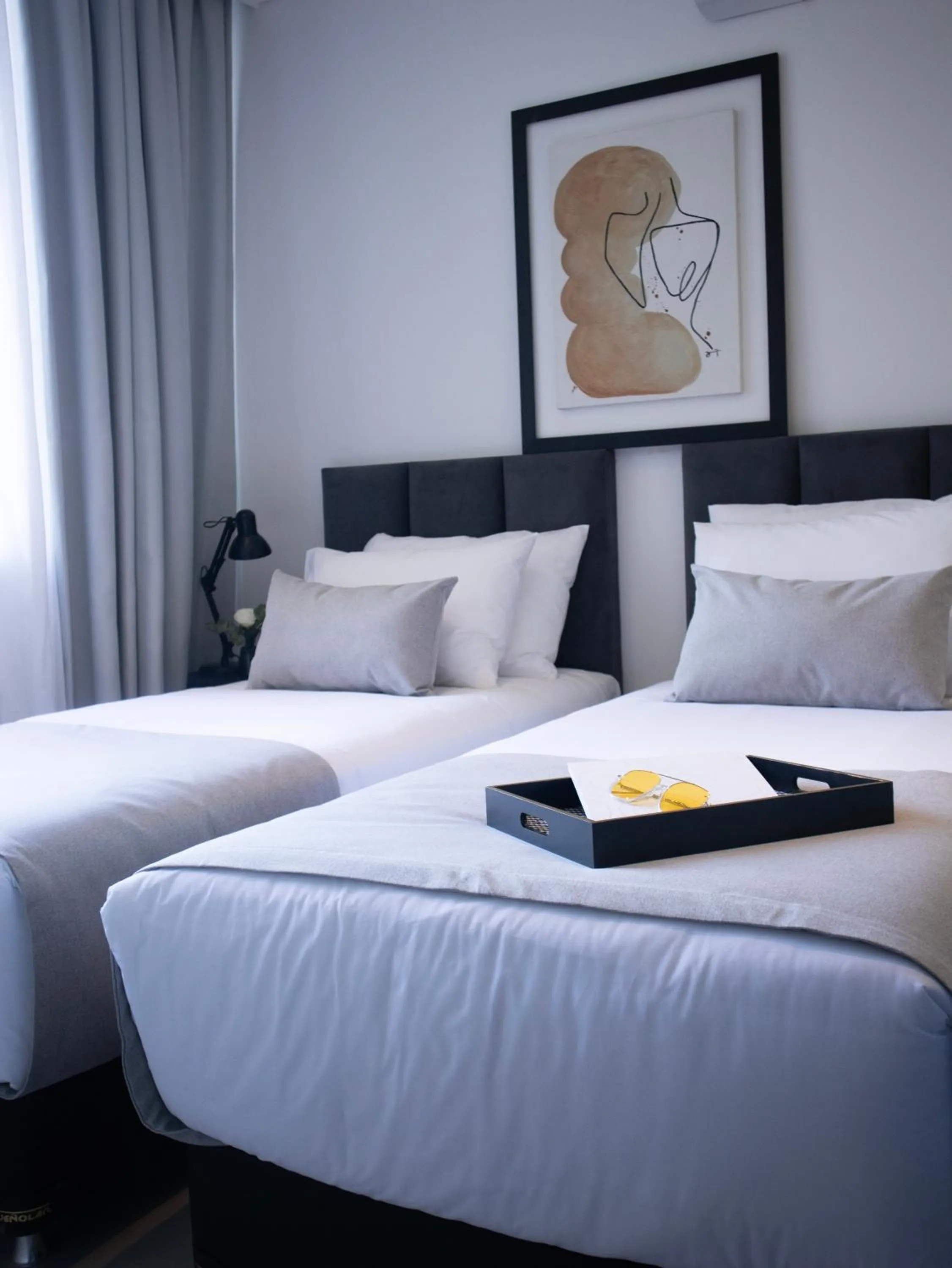 Bed in Divina Tower Apart Hotel