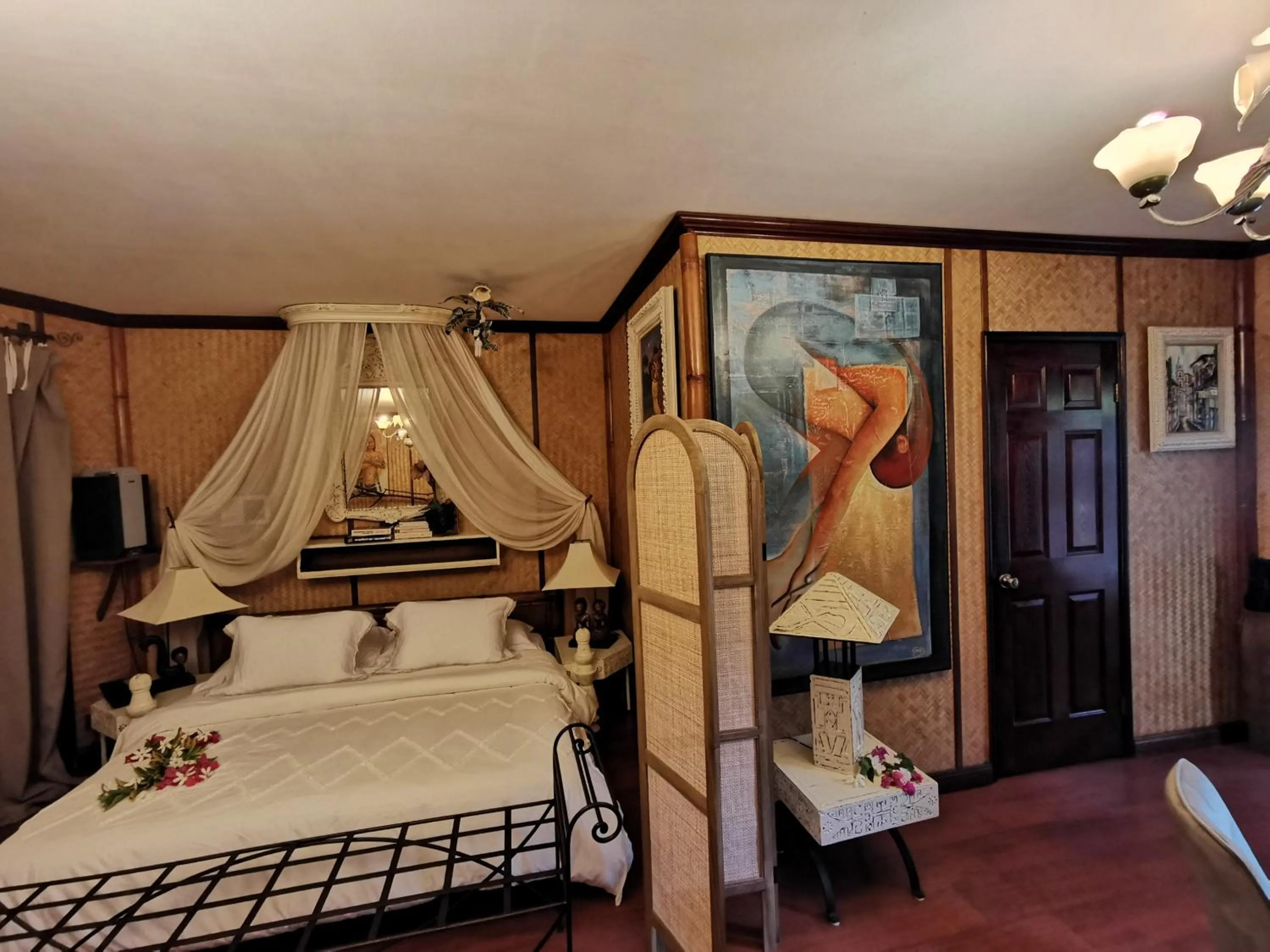 Bed in Hôtel Fenua Mata'i'oa