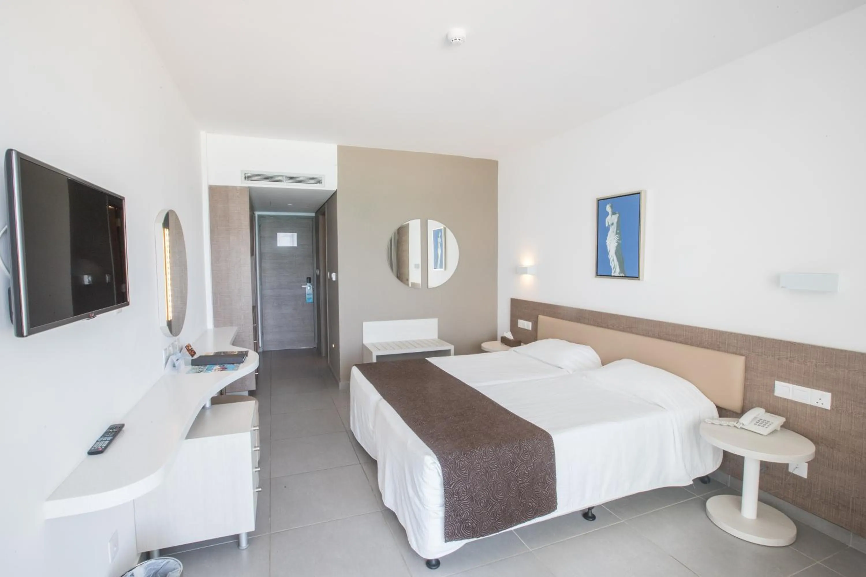 Photo of the whole room, Bed in Vassos Nissi Plage Hotel & Spa