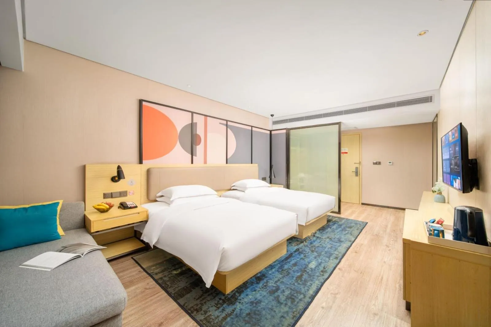 Photo of the whole room, Bed in Echarm Hotel Kunming Changshui International Airport