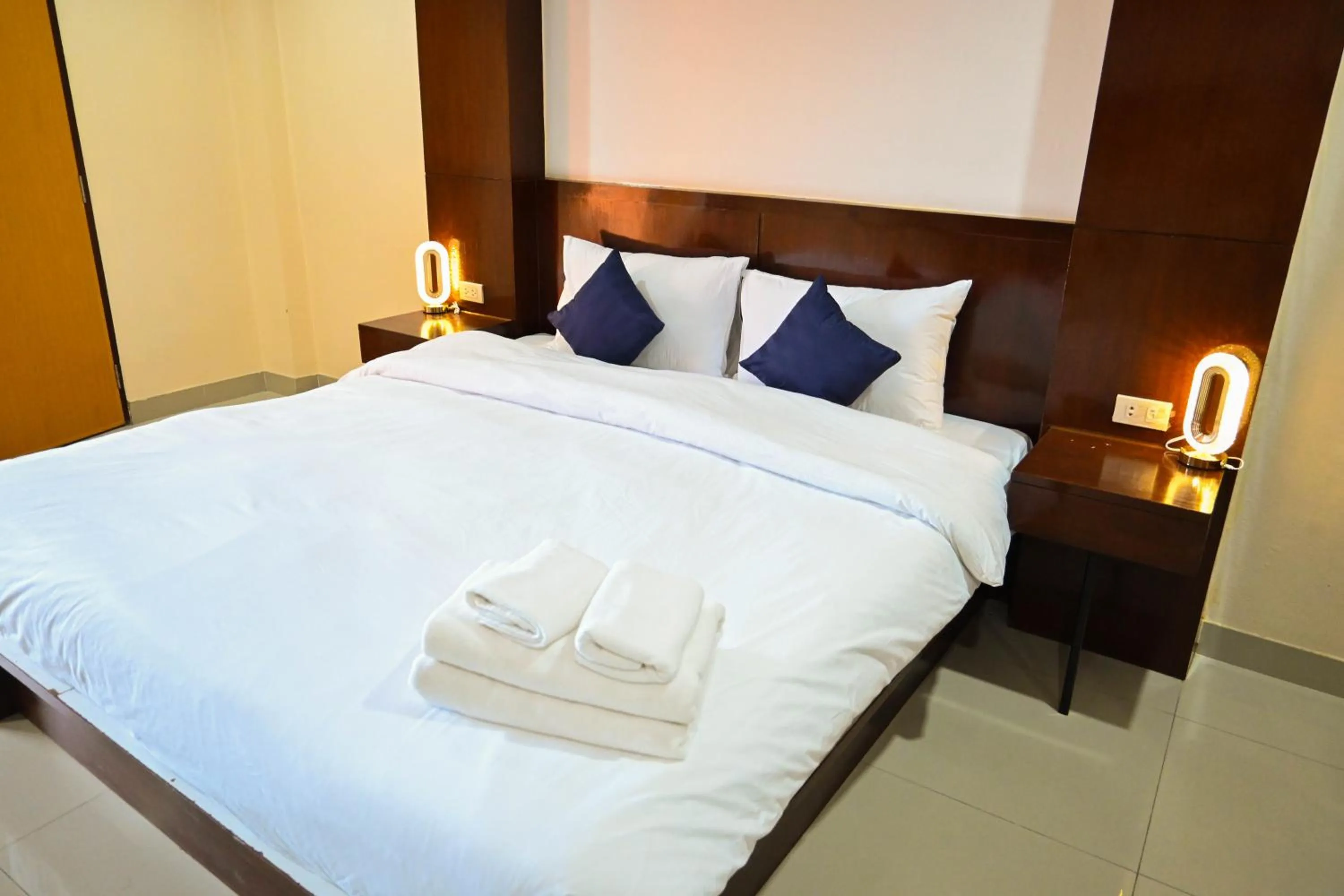 Bed in Royal Star Suites pattaya