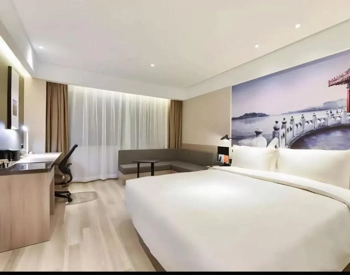 Bed in Atour Hotel Beijing Guomao Jingsong Railway Station