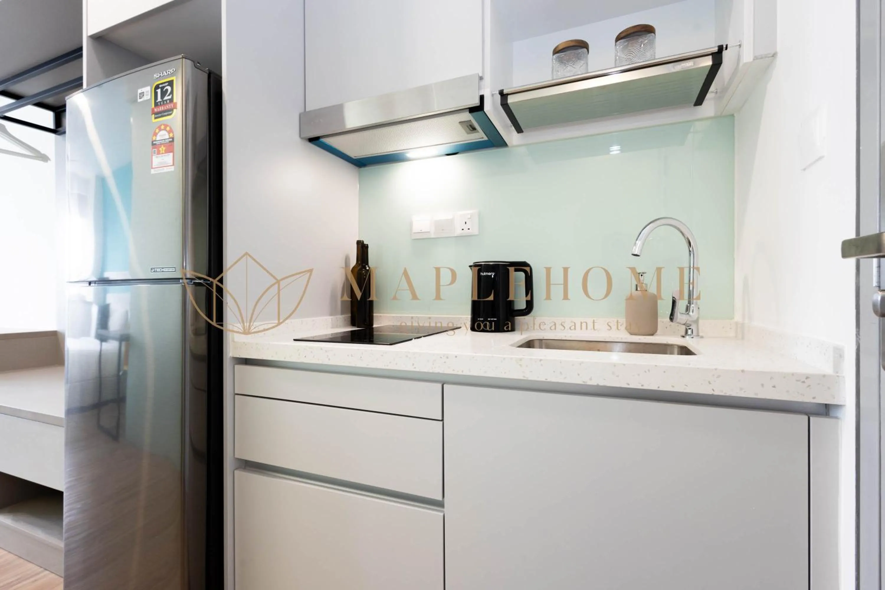 Kitchen or kitchenette in Riveria Premier Suites Kuala Lumpur