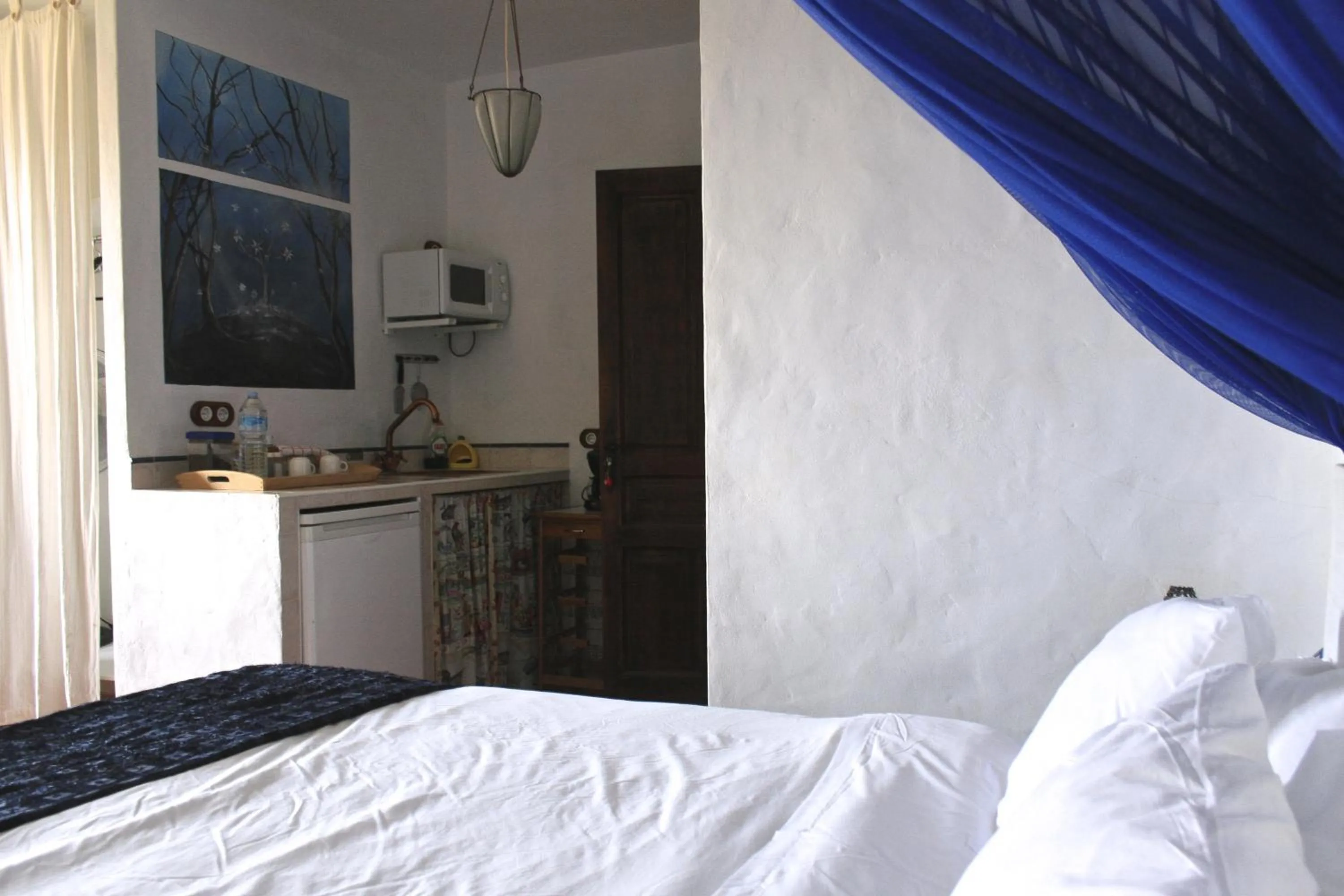 Kitchen or kitchenette, Bed in Paraiso Perdido