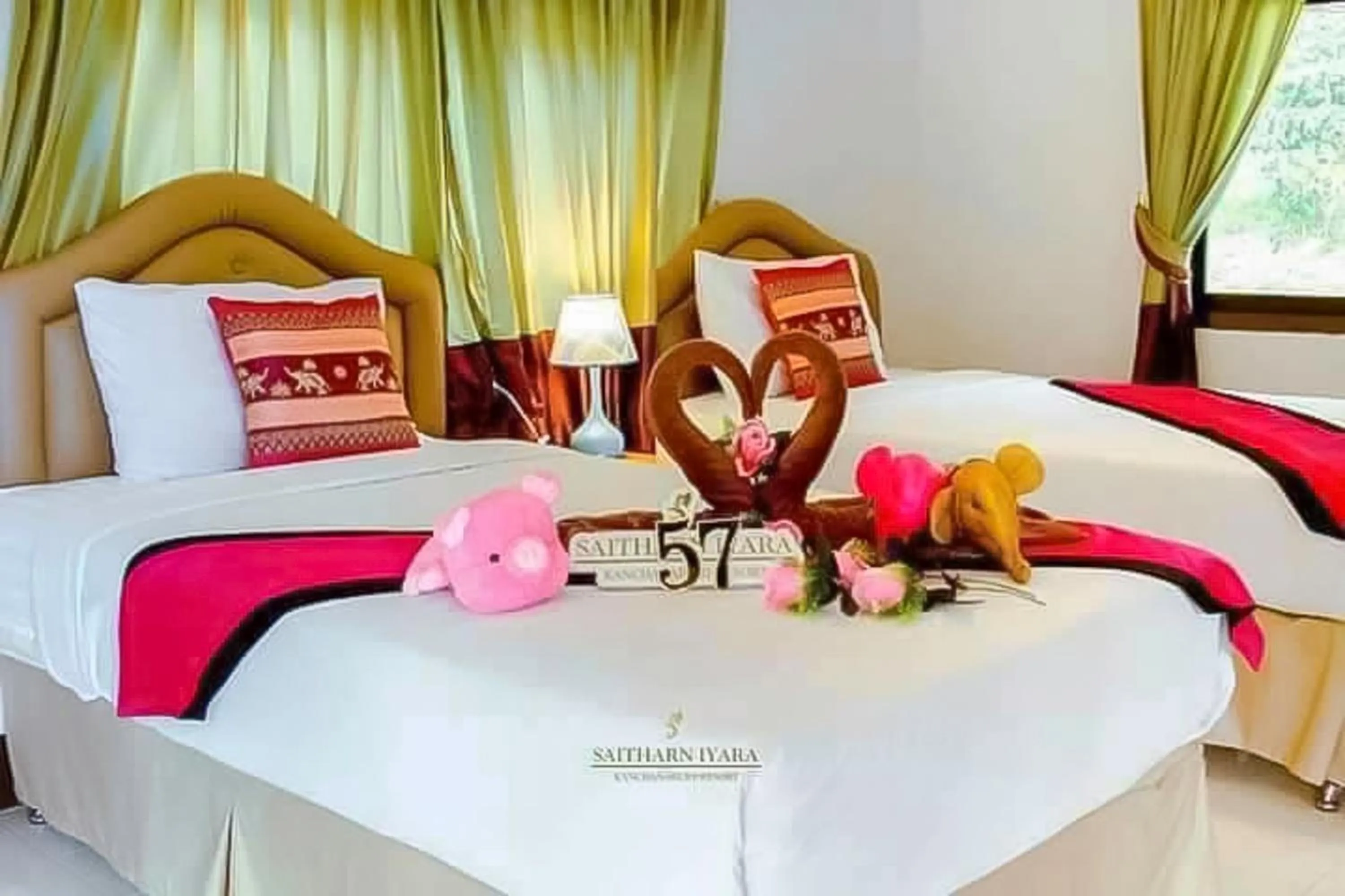 Bed in Saitharn Iyara Resort