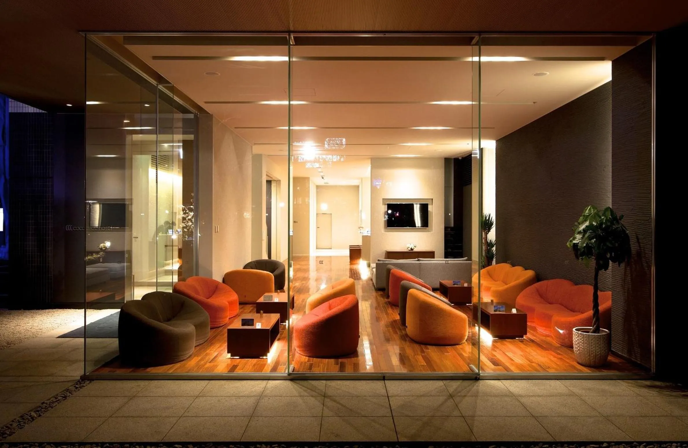 Communal lounge/ TV room in Cocochee Hotel Numazu